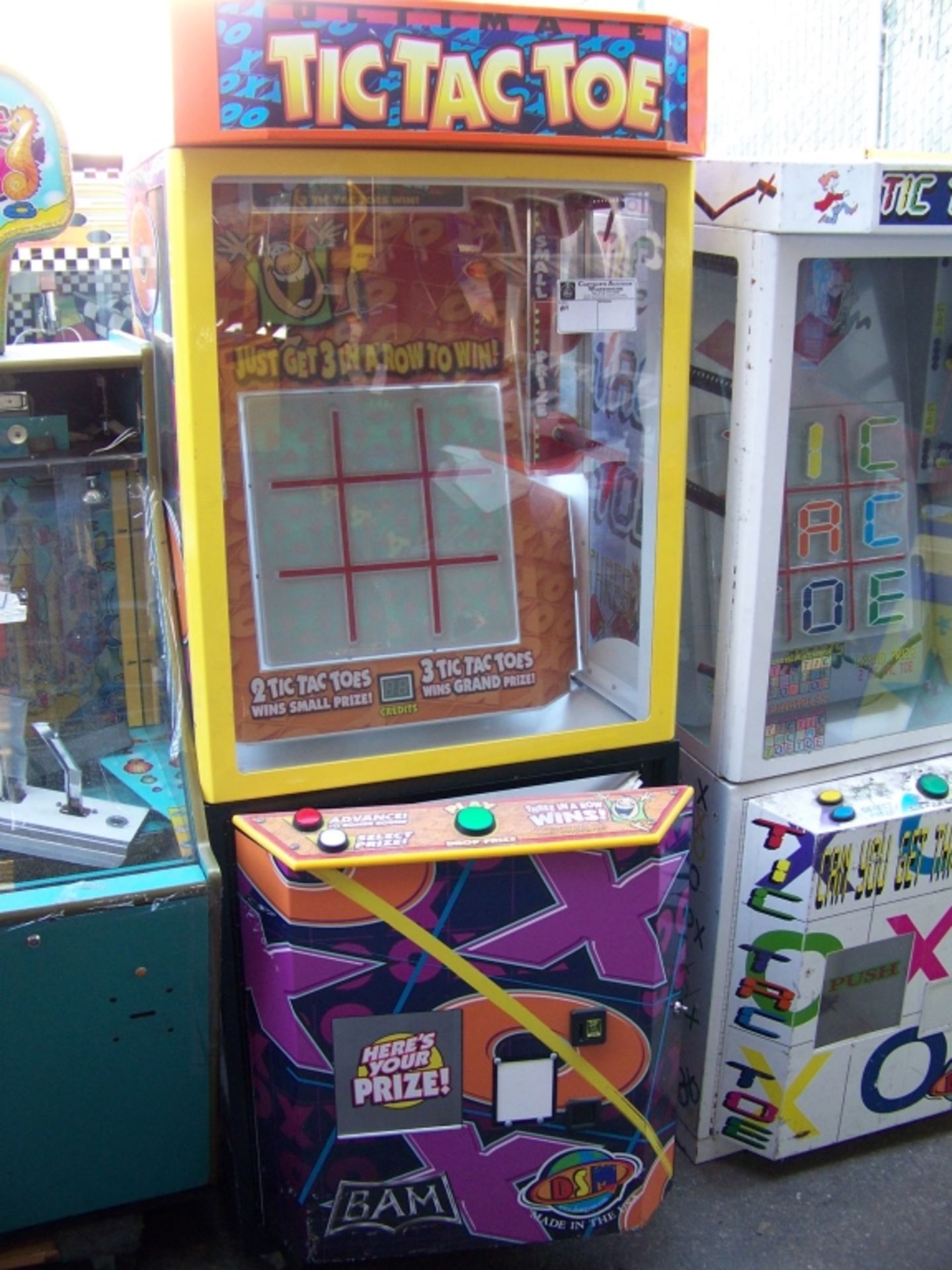 TIC TAC TOE PRIZE REDEMPTION GAME ORANGE CAB Item is in used condition. Evidence of wear and