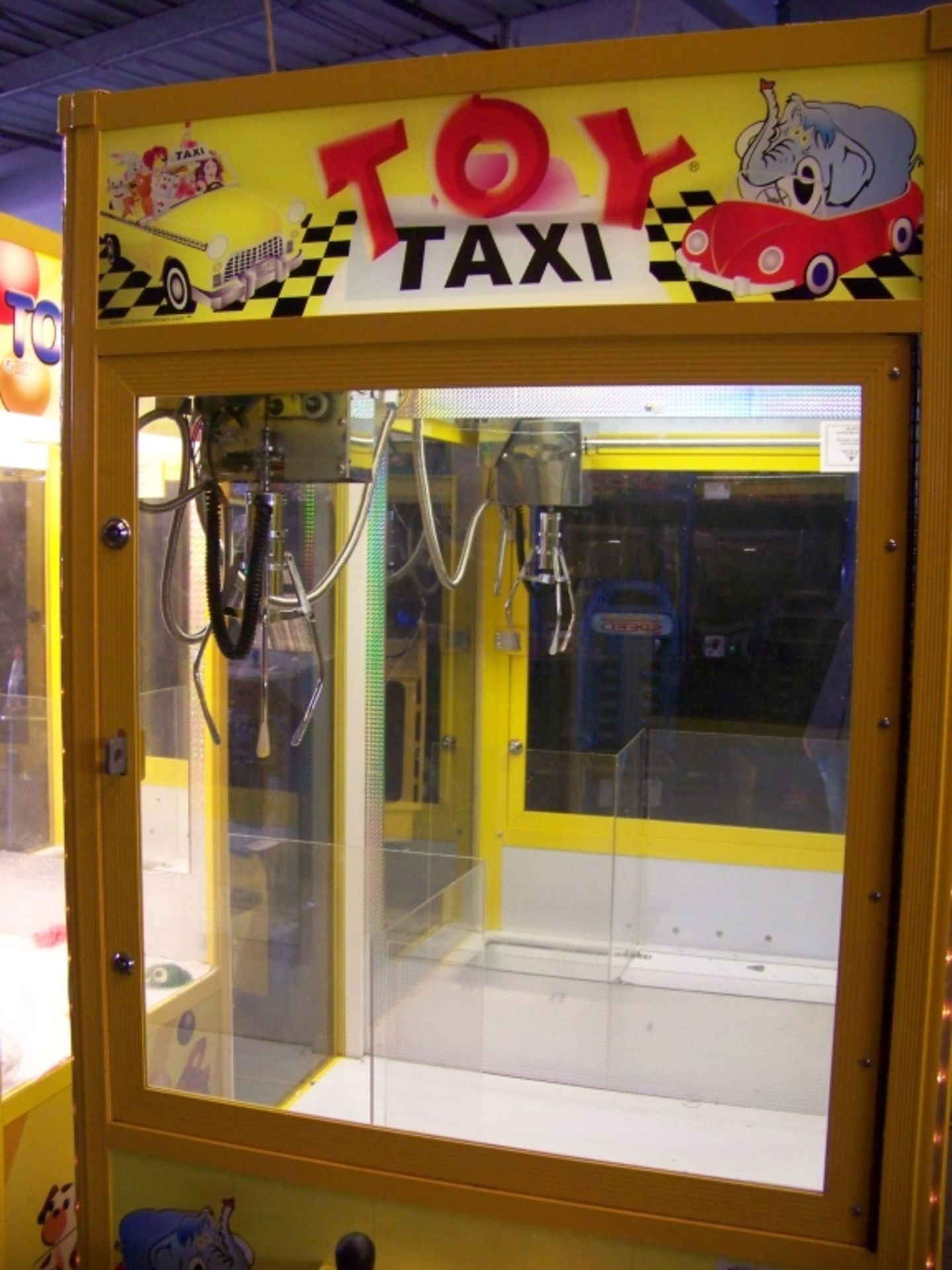 30"" TOY TAXI PLUSH CLAW CRANE MACHINE Item is in used condition. Evidence of wear and commercial - Image 4 of 4