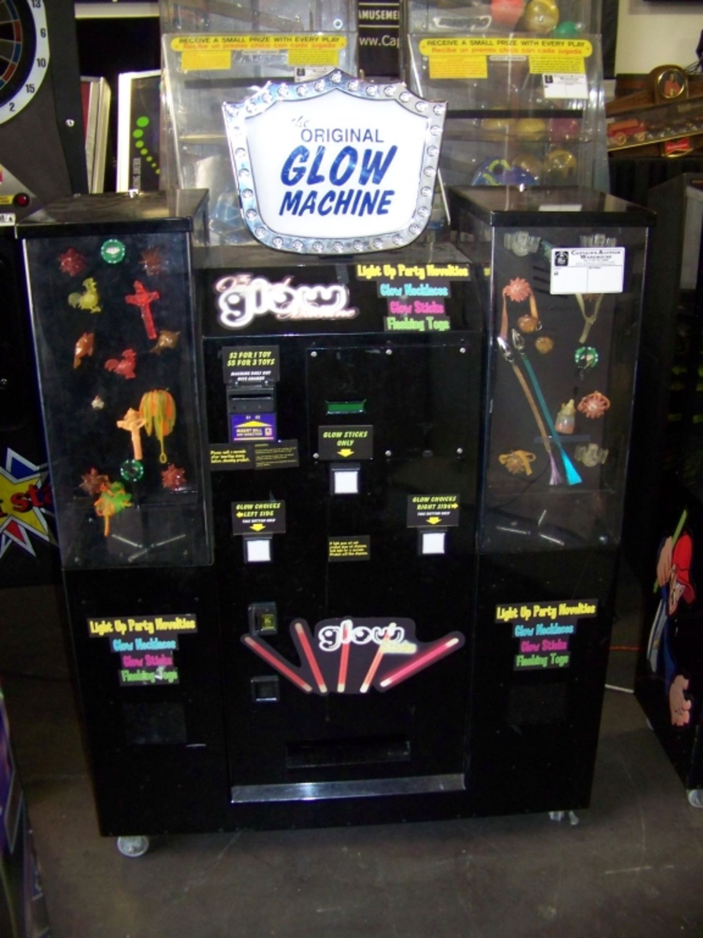 THE ORIGINAL GLOW MACHINE VENDING KIOSK Item is in used condition. Evidence of wear and commercial