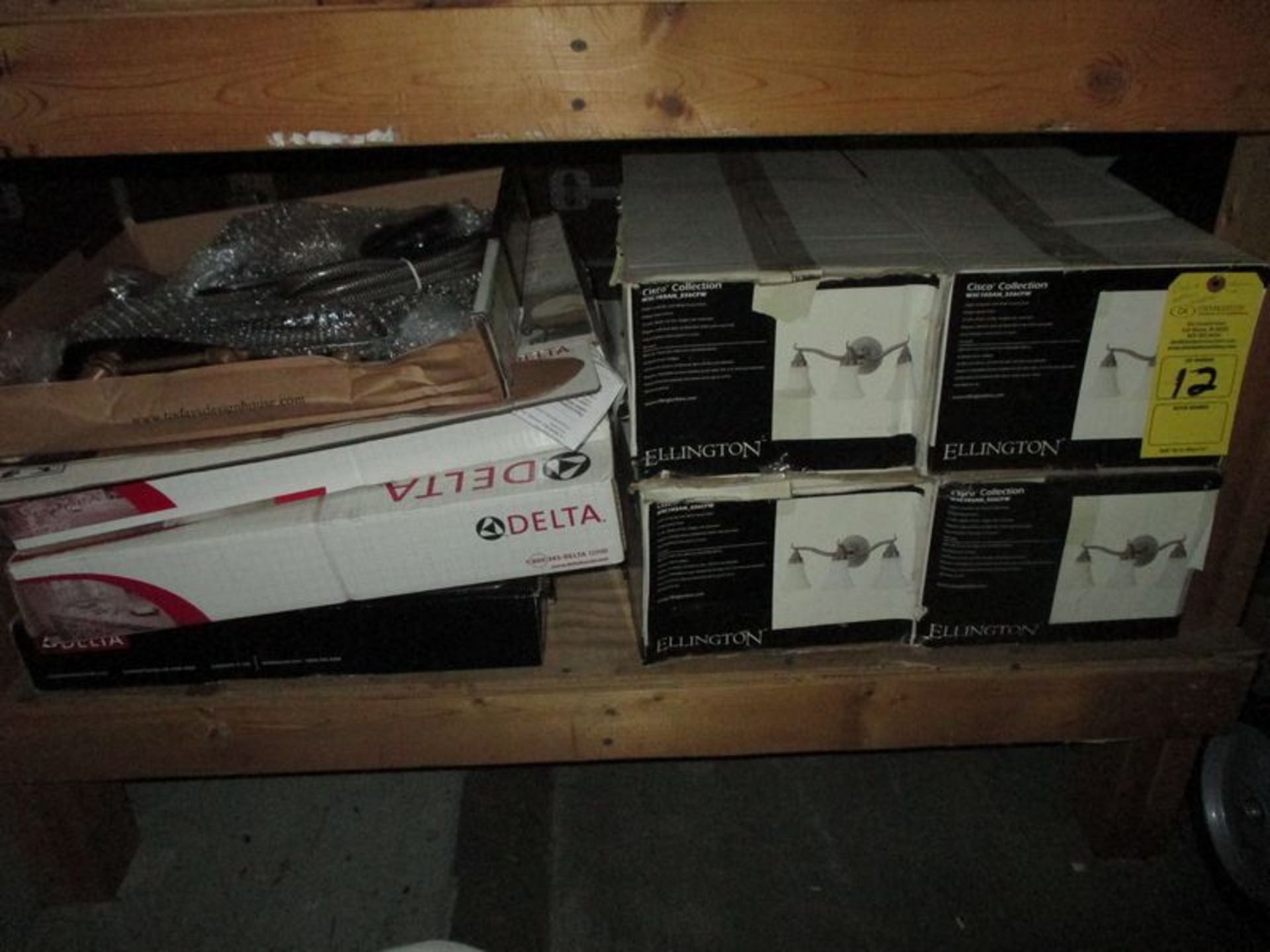 CONTENTS OF BOTTOM SHELF INCLUDING ELLINGTON LIGHTS (CISCO COLLECTION); DELTA FAUCETS & MORE (