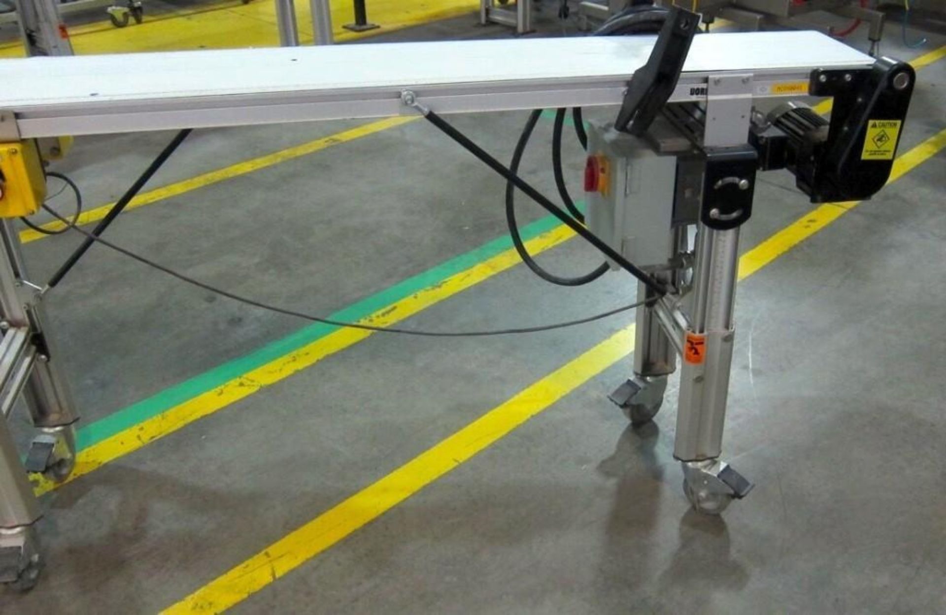 Dorner 2200 series aluminum conveyor with a thin plastic belt - Image 4 of 8