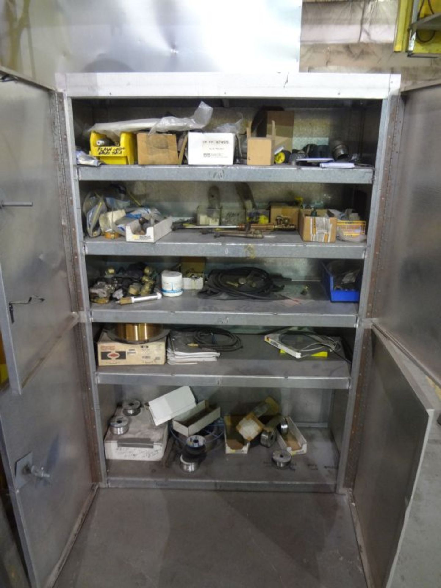 FOUR-DOOR CABINET W/ MISC. WELDING SUPPLIES