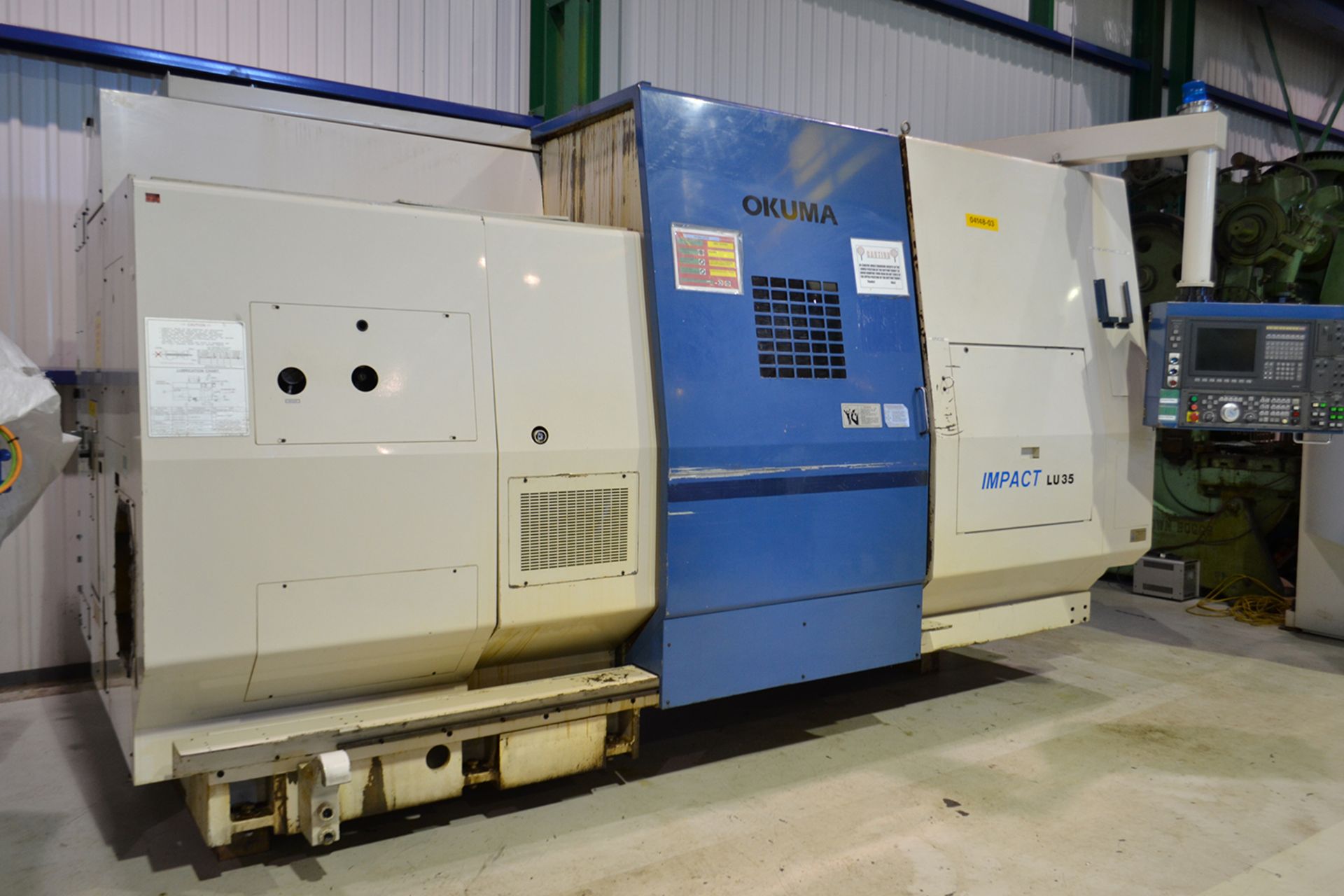 OKUMA IMPACT LU35, TWIN TURRET CNC LATHE, SWING OVER BED: 29.13", DISTANCE BETWEEN CENTERS 33.46",