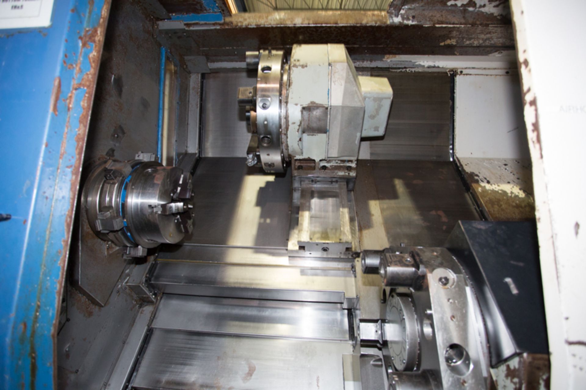 OKUMA IMPACT LU35, TWIN TURRET CNC LATHE, SWING OVER BED: 29.13", DISTANCE BETWEEN CENTERS 33.46", - Image 4 of 21