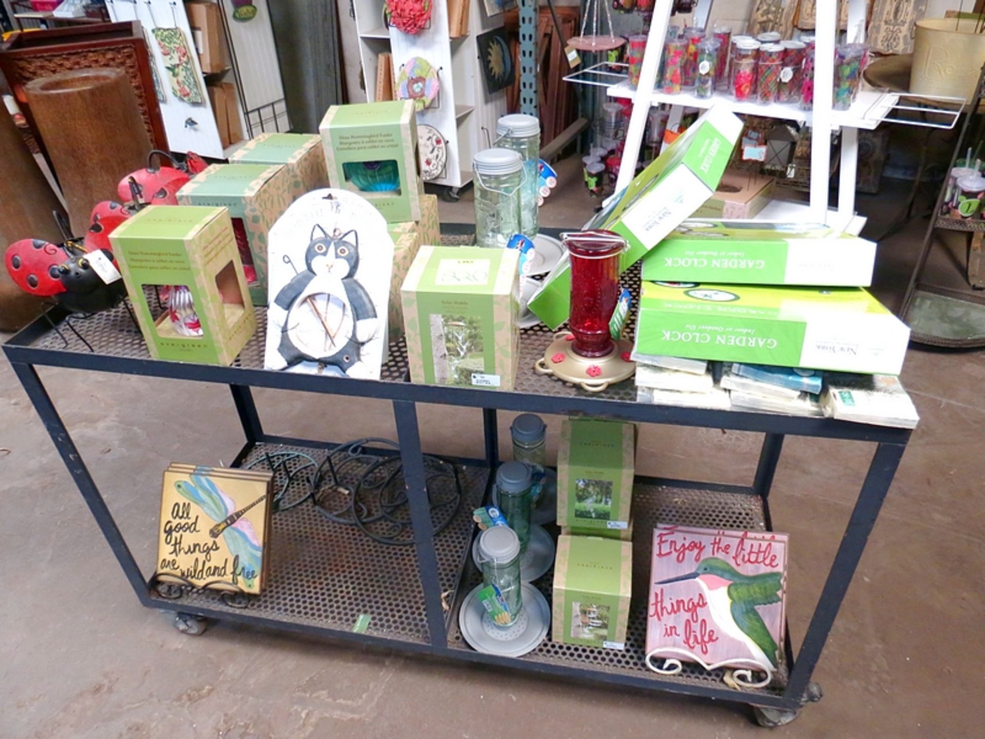 Lot Hummingbird Feeders, Stepping Stones, Garden Clocks w/Display Units & Rolling Cart