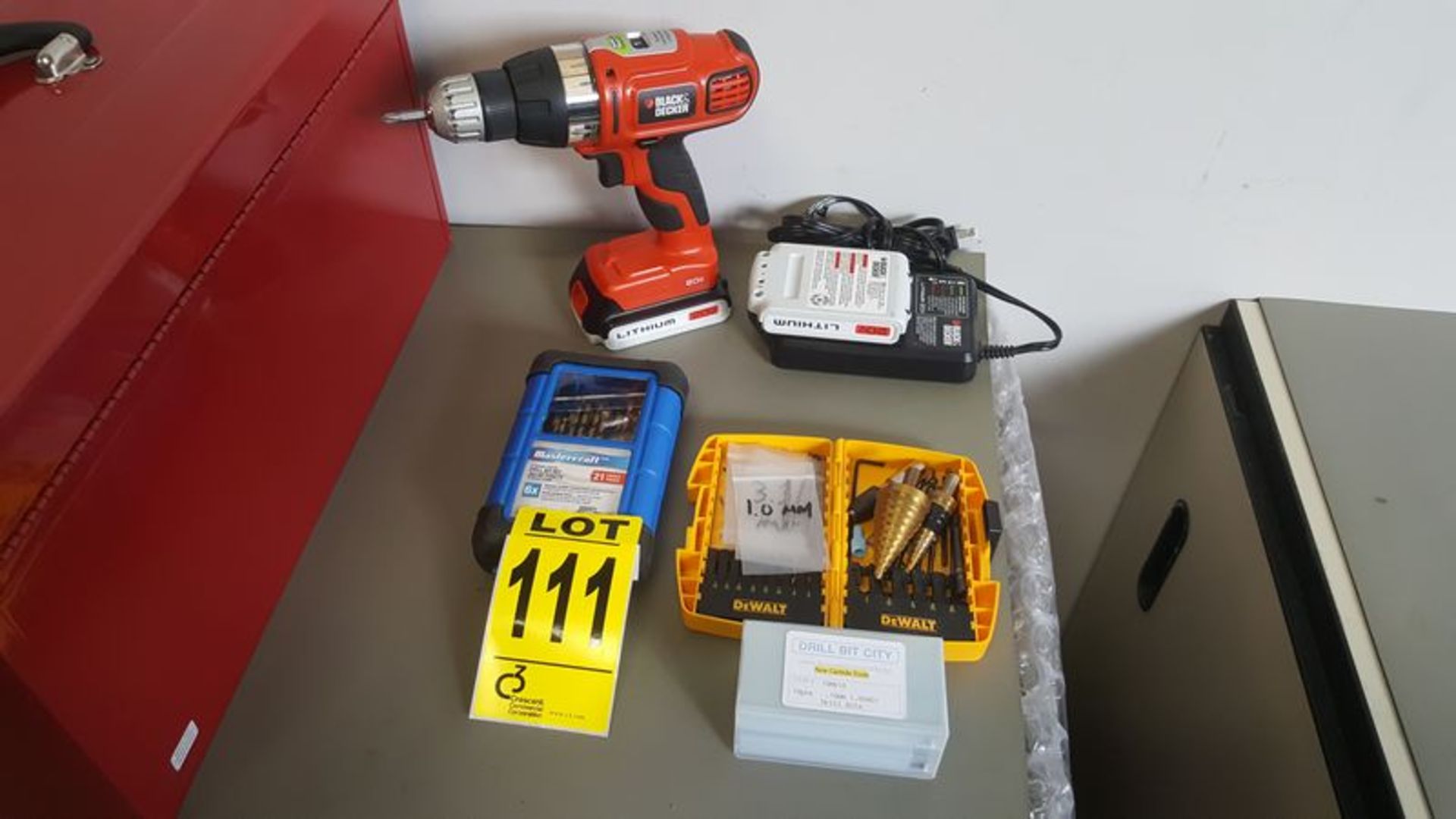 "Black and Decker" 20V cordless driver with 2 lithium batteries and charger and 3 incomplete drill