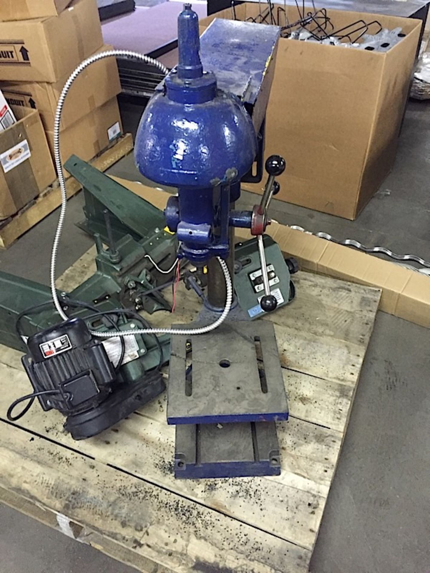 Blue drill press