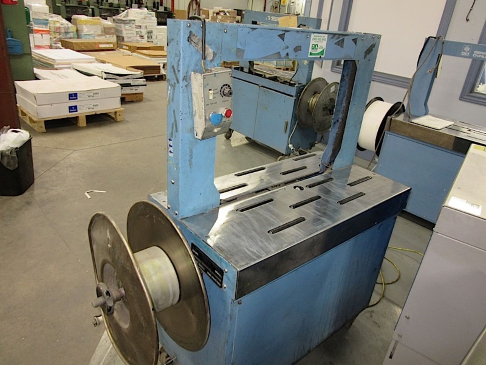 STRAPPING MACHINE