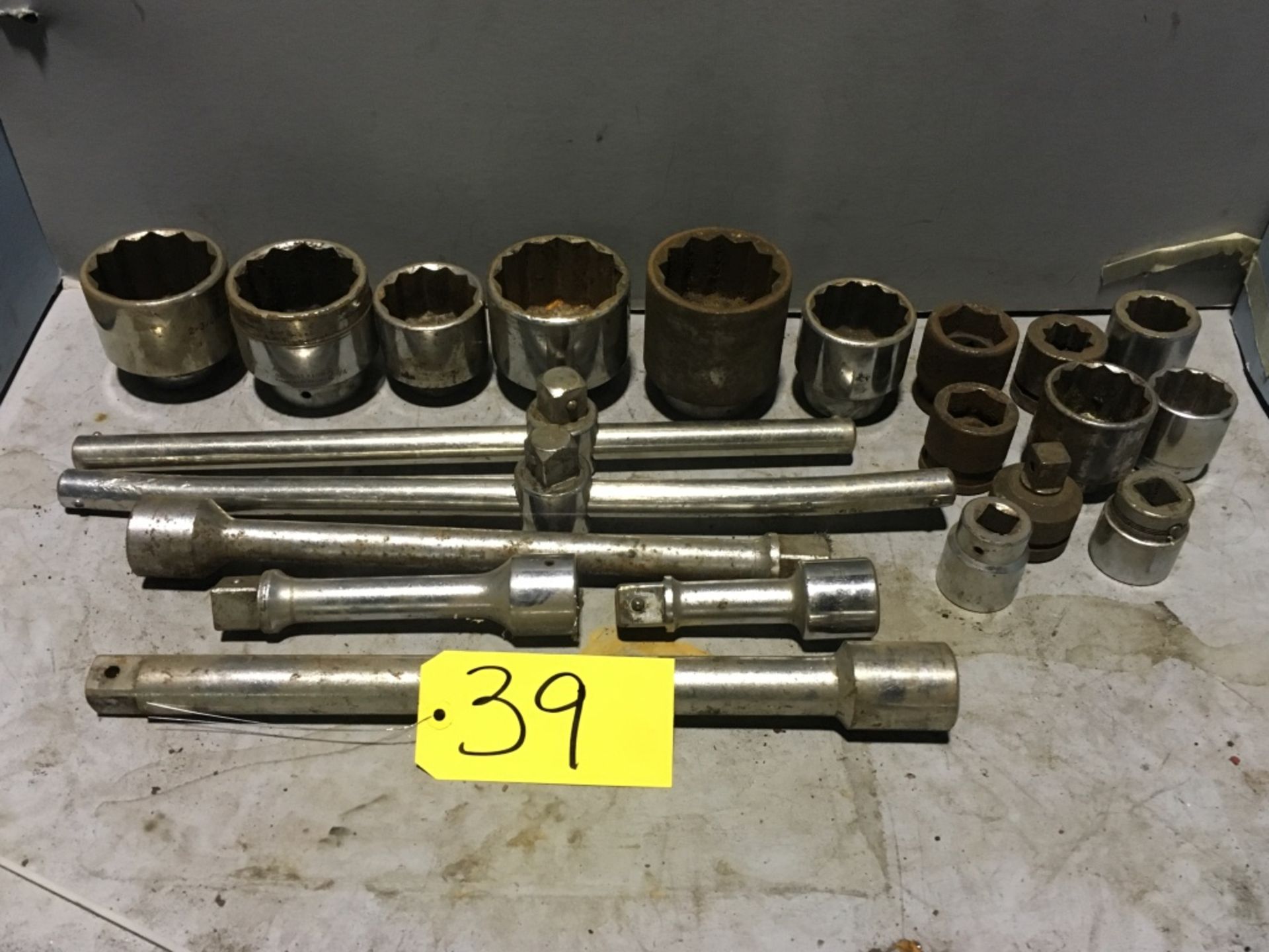 Approximately (27) pieces, assorted 3/4" drive sockets, breaker bars and attachments.