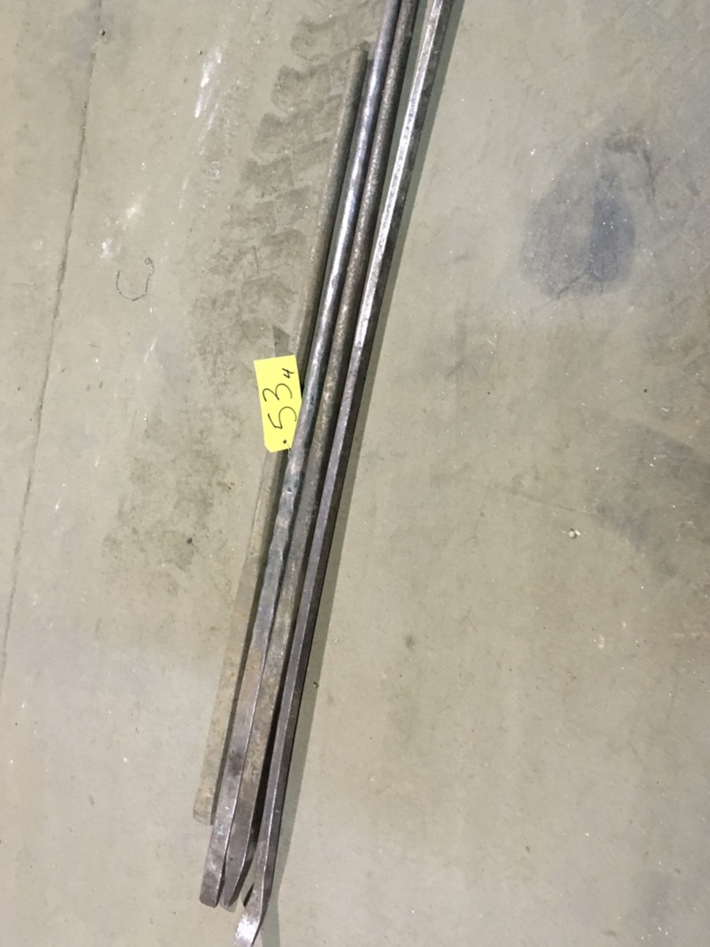 Approximately (4) long handle pry bars.