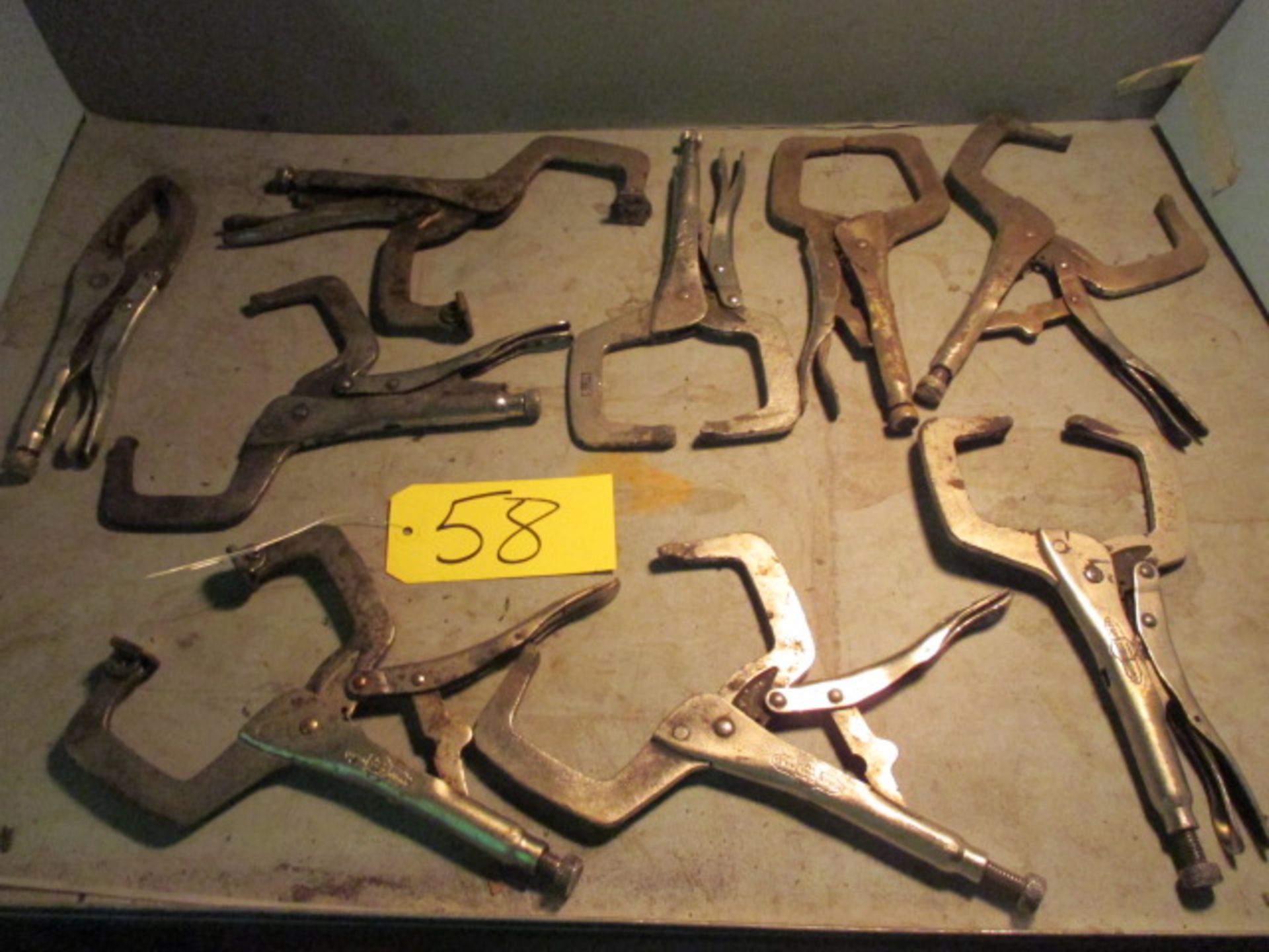 Approximately (9) vise grips.