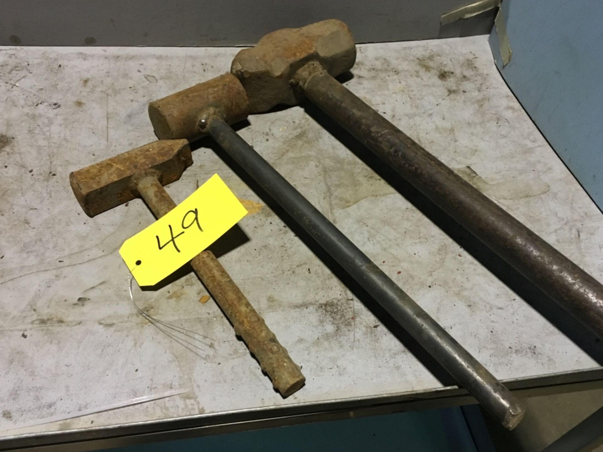 Approximately (3) steel handle hammers.
