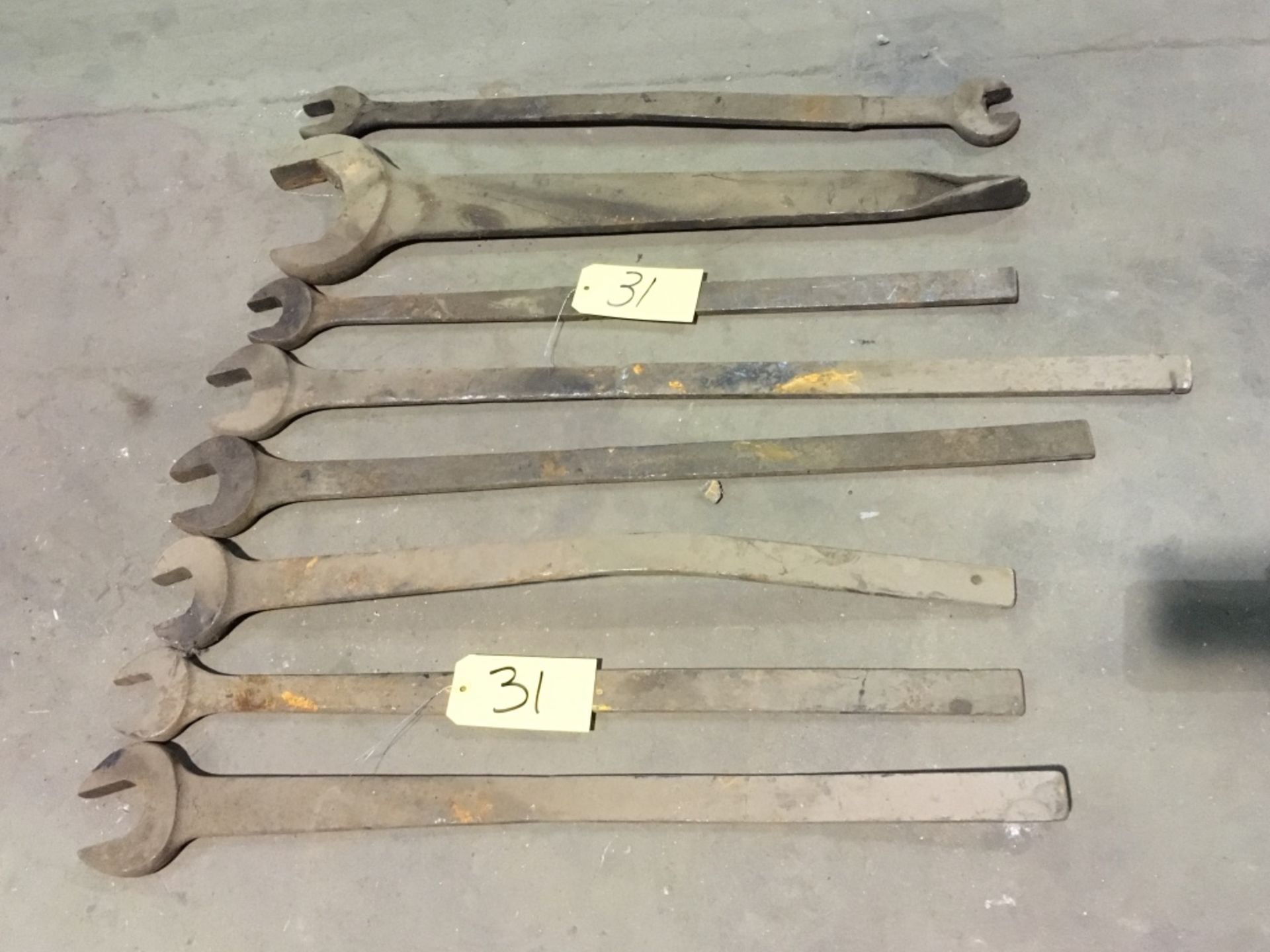 Approximately (8) long handled open end wrenches, heavy duty.