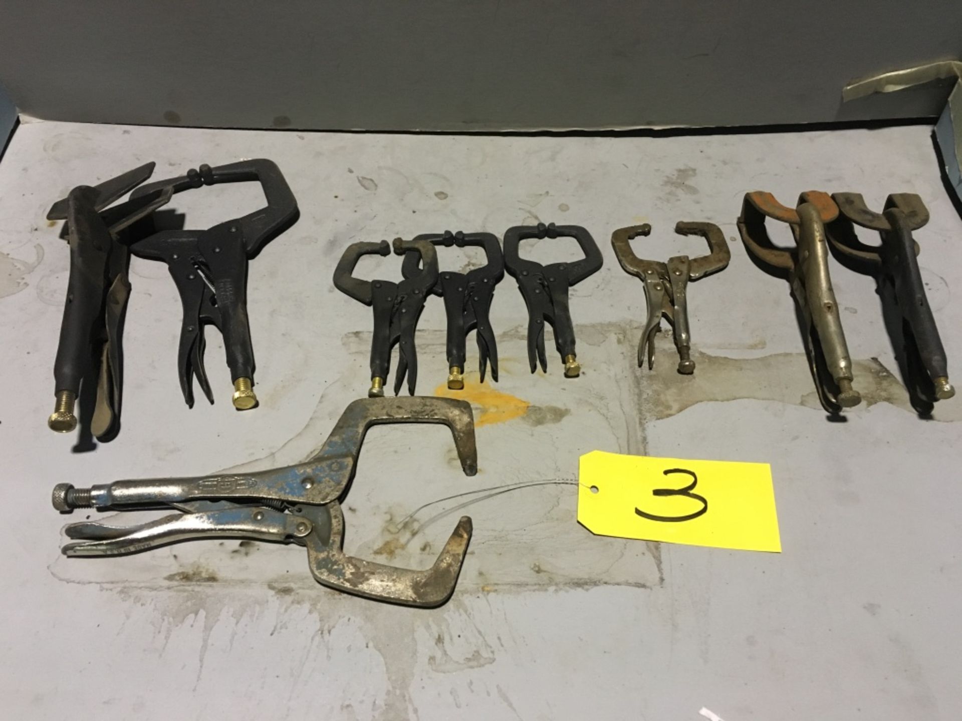 Approximately (10) vise grips.