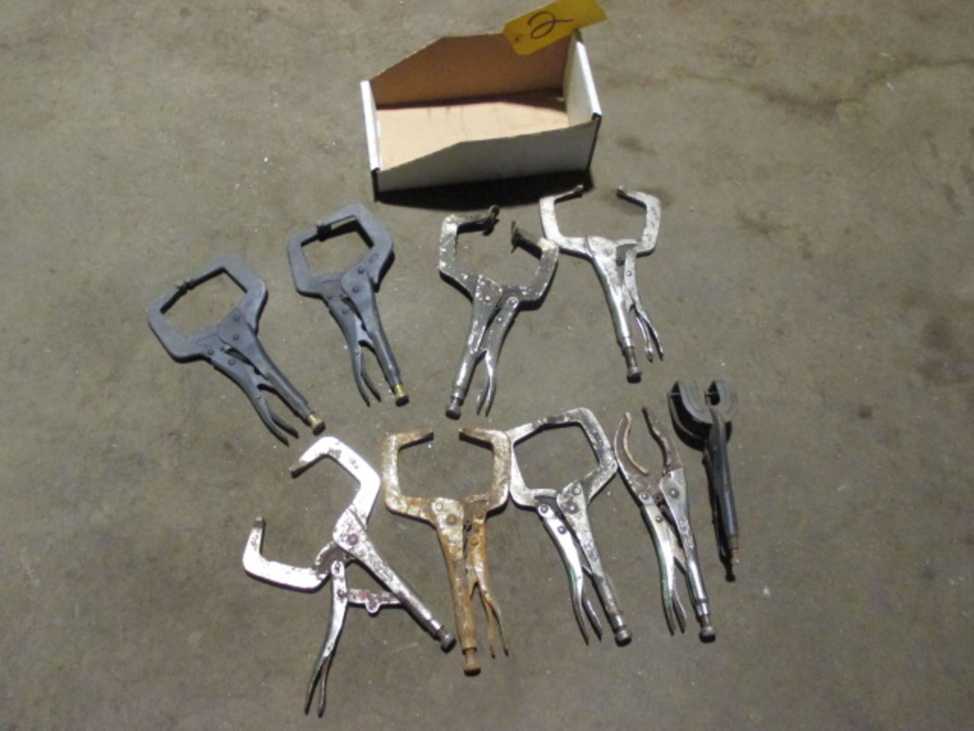 Approximately (9) vise grips.