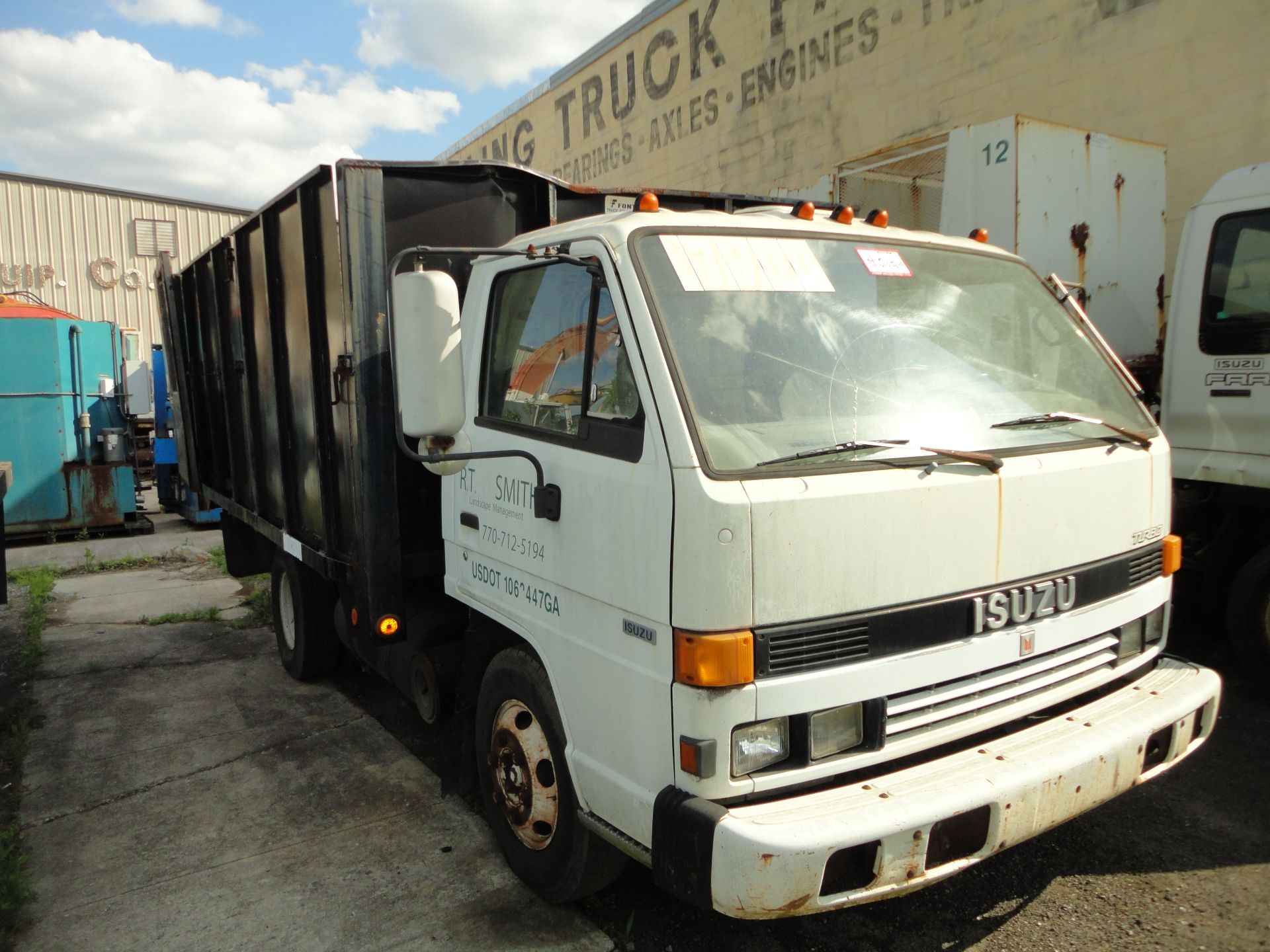 1990 Isuzu NPR Flatbed Dump