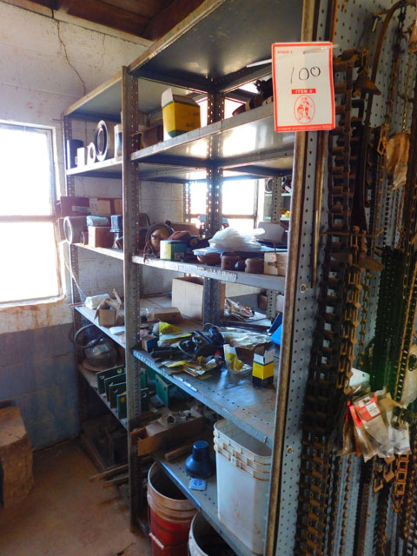 Remaining content of shop barn to include: spare parts, shop tools, shelving, bolt bins, hand tools,