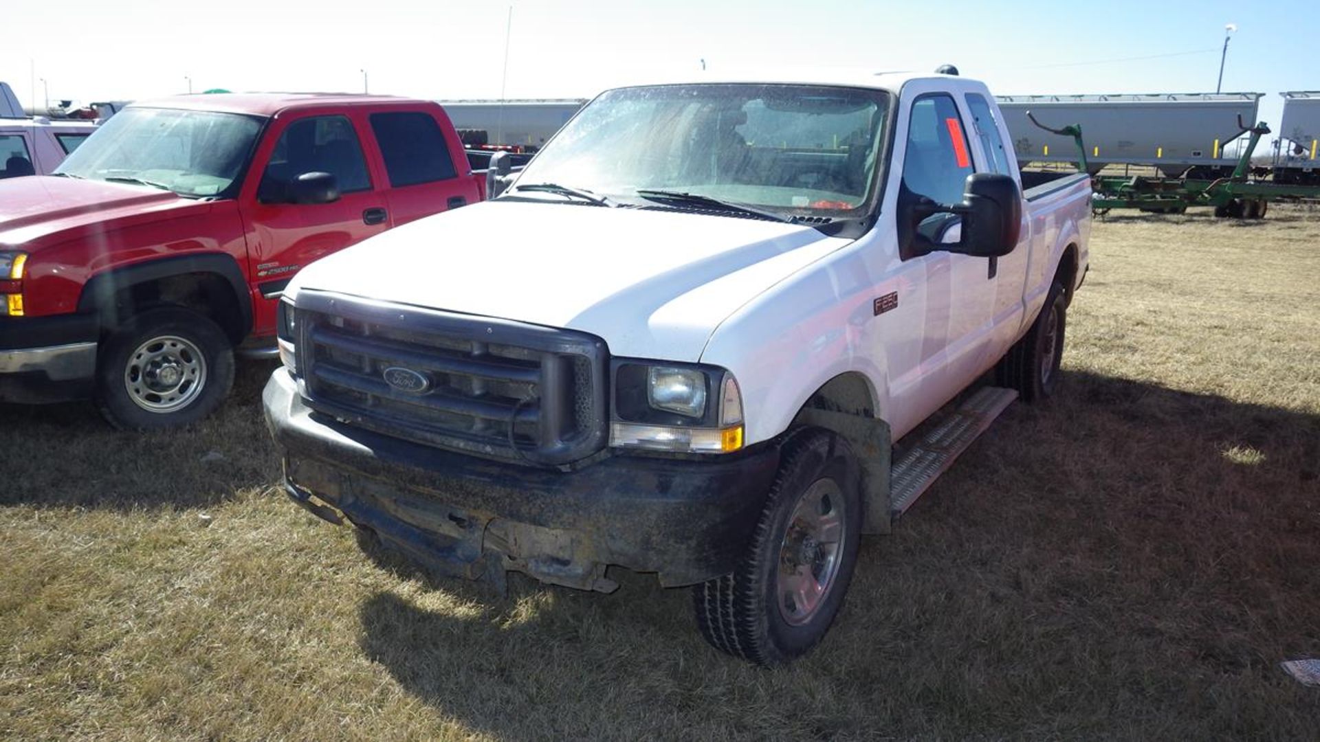 2004 Ford F250 Ext Cab long box 4 x 4 5.4L v8 auto showing 417,273 kms Vin# 1FTNX21L74EC67165 and