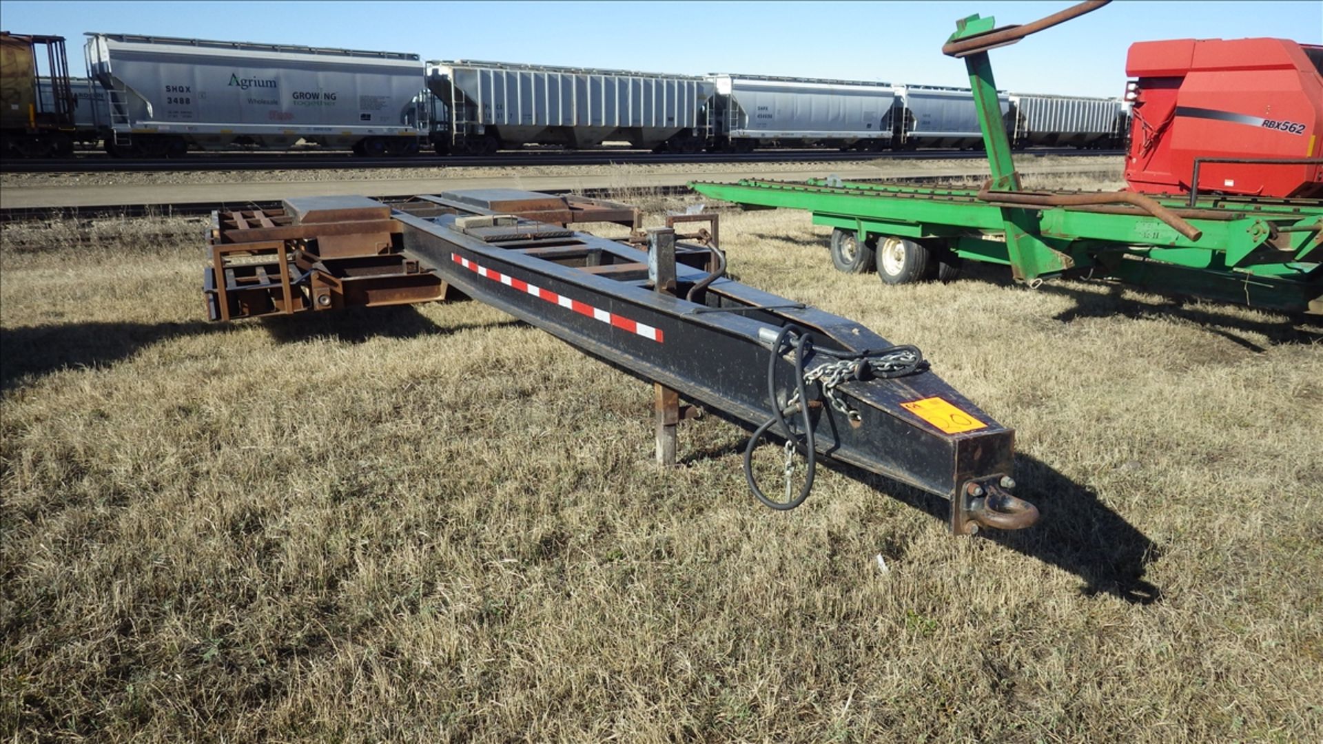 Trailtech Tandem Axle pintle hitch low boy sprayer transport trailer with pintle hitch at rear. Tire