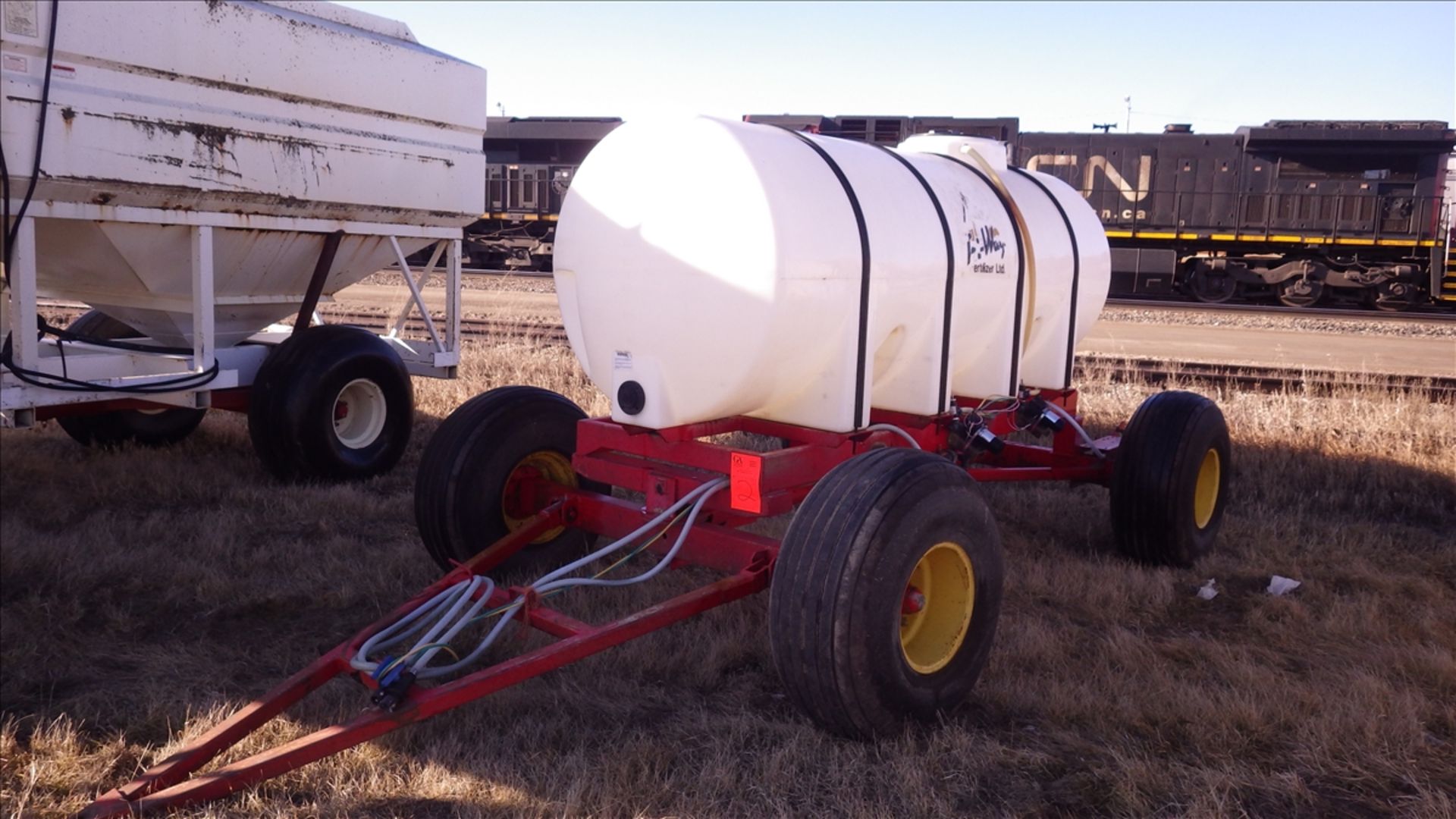 Liquid fertilizer cart with approx 1000 imp Gal tank 6.5 HP gas water pump, electric control valves,