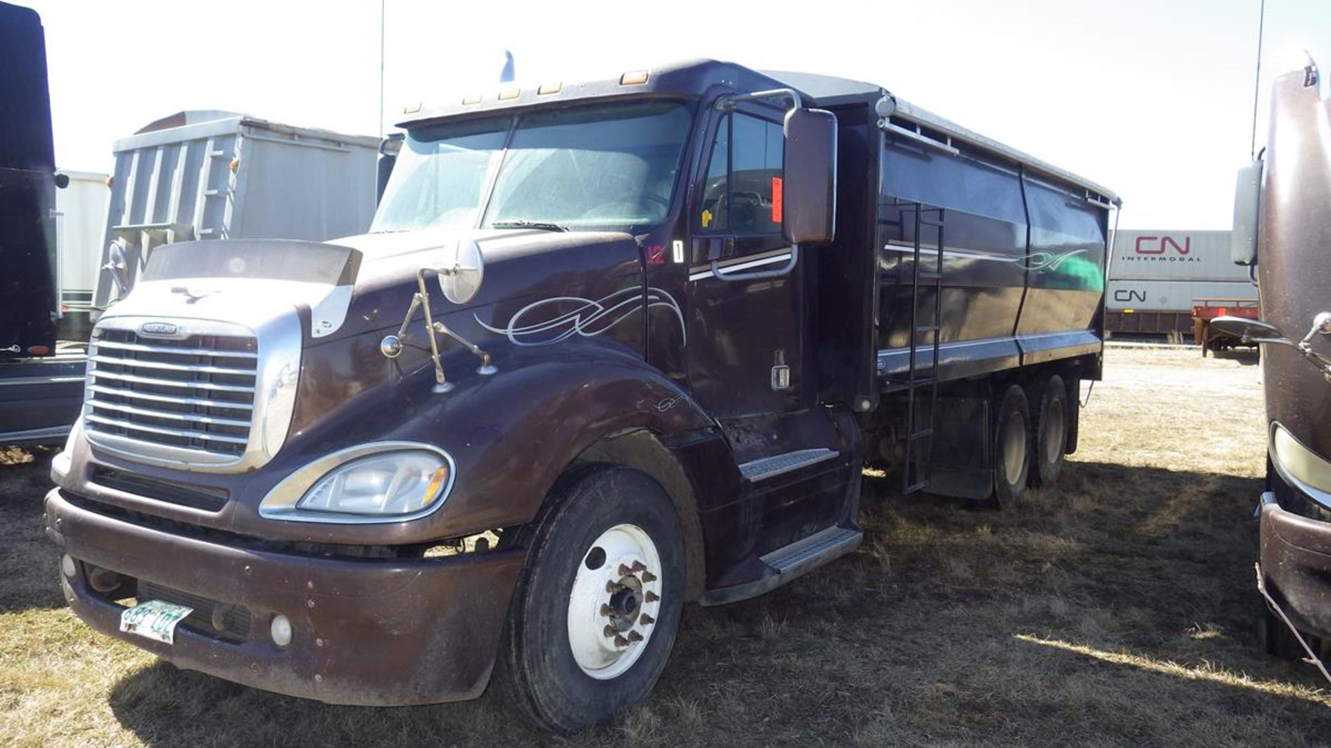 2006 Freightliner Grain Truck Vin# 1FUJA6CK36PW68708 showing 932749.6 Kms and 15,187 Hours.