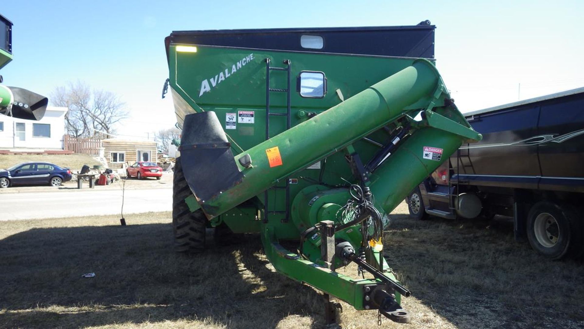 Brent Avalanche grain cart with roll top cover, walking tandem axle and approx 19 inch discharge