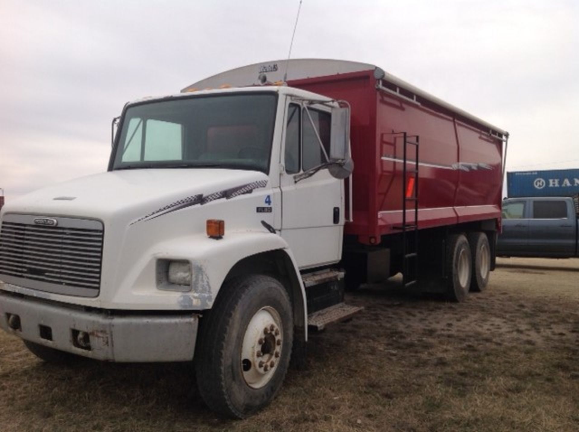 1996 Freightliner Grain truck with box and remote control hoist and end gate. Vin# 1FVX0LBBXTL710591