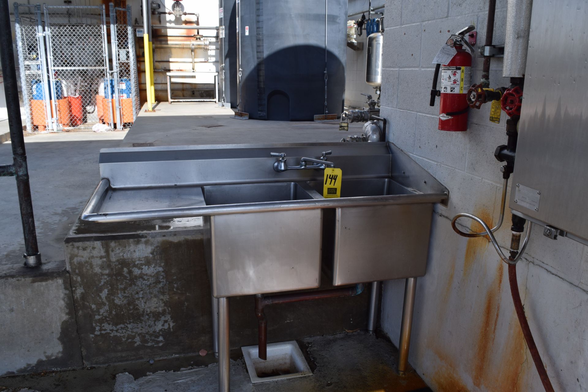 S/S Double Bowl Sink with Back Splash Rigging Charge: $100