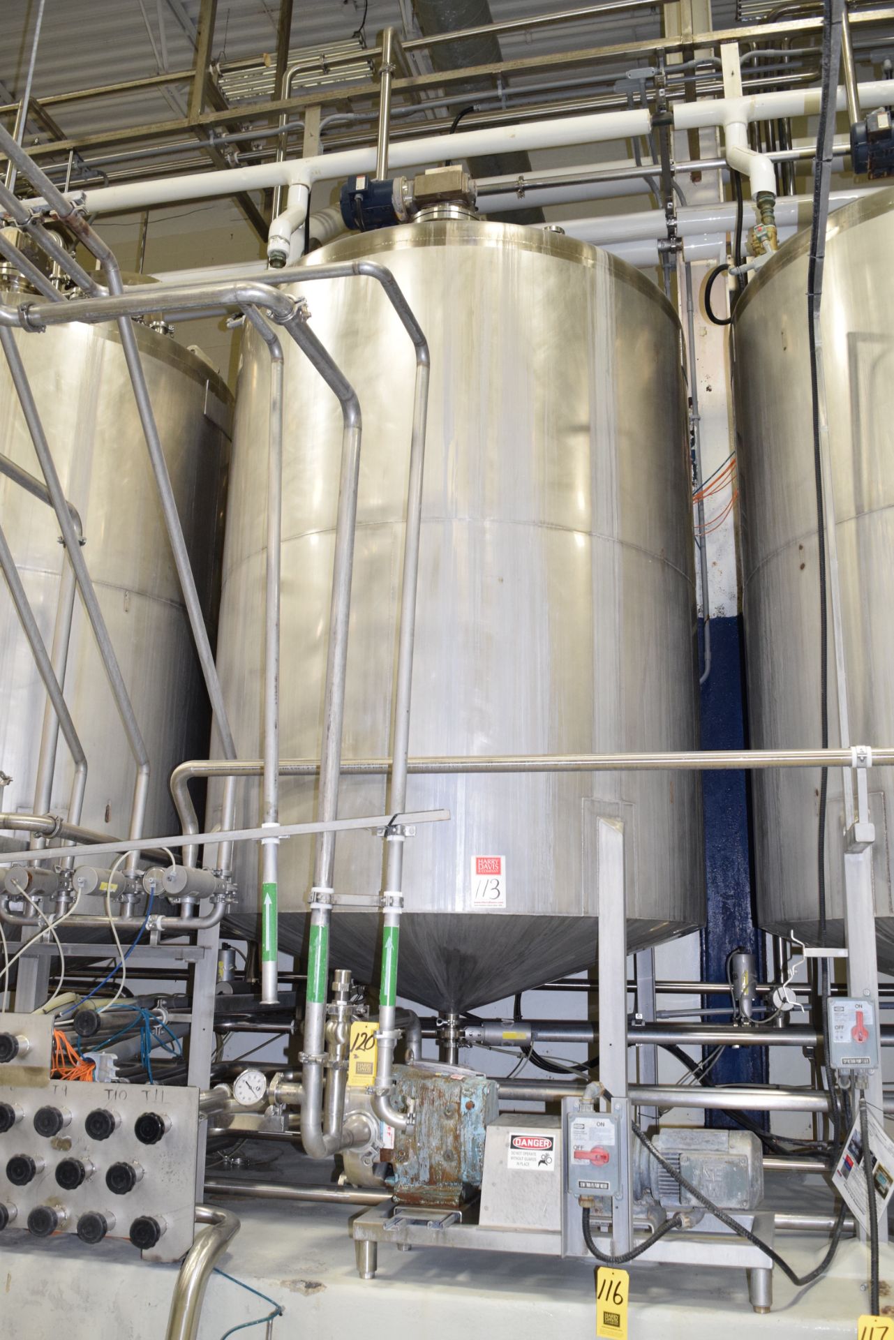 6,000 Liter, 1,500 Gallon S/S Single-Shell Dome-Top Cone-Bottom Tank with 2013 Admix Agitation,