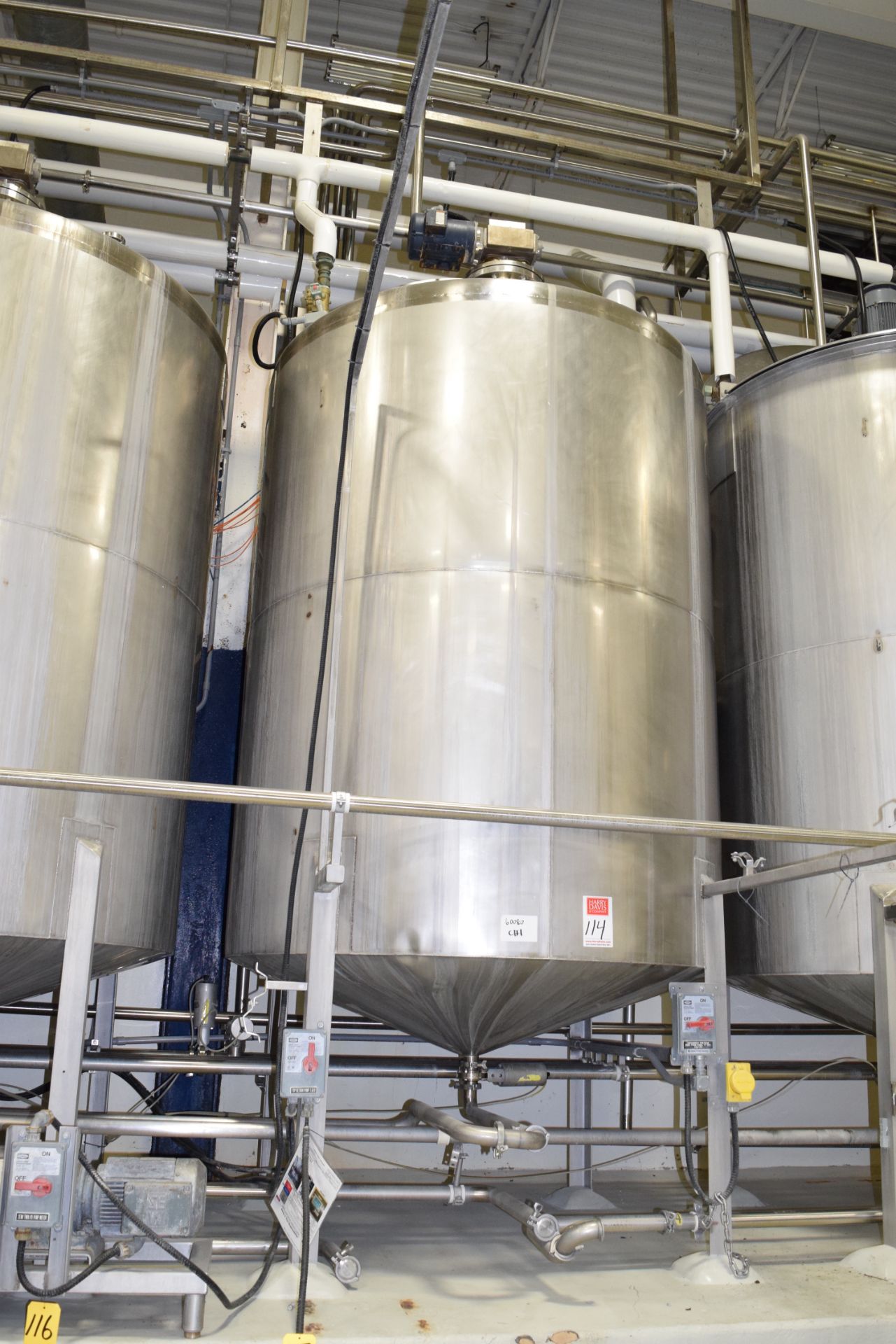 6,000 Liter, 1,500 Gallon S/S Single-Shell Dome-Top Cone-Bottom Tank with 2013 Admix Agitation,