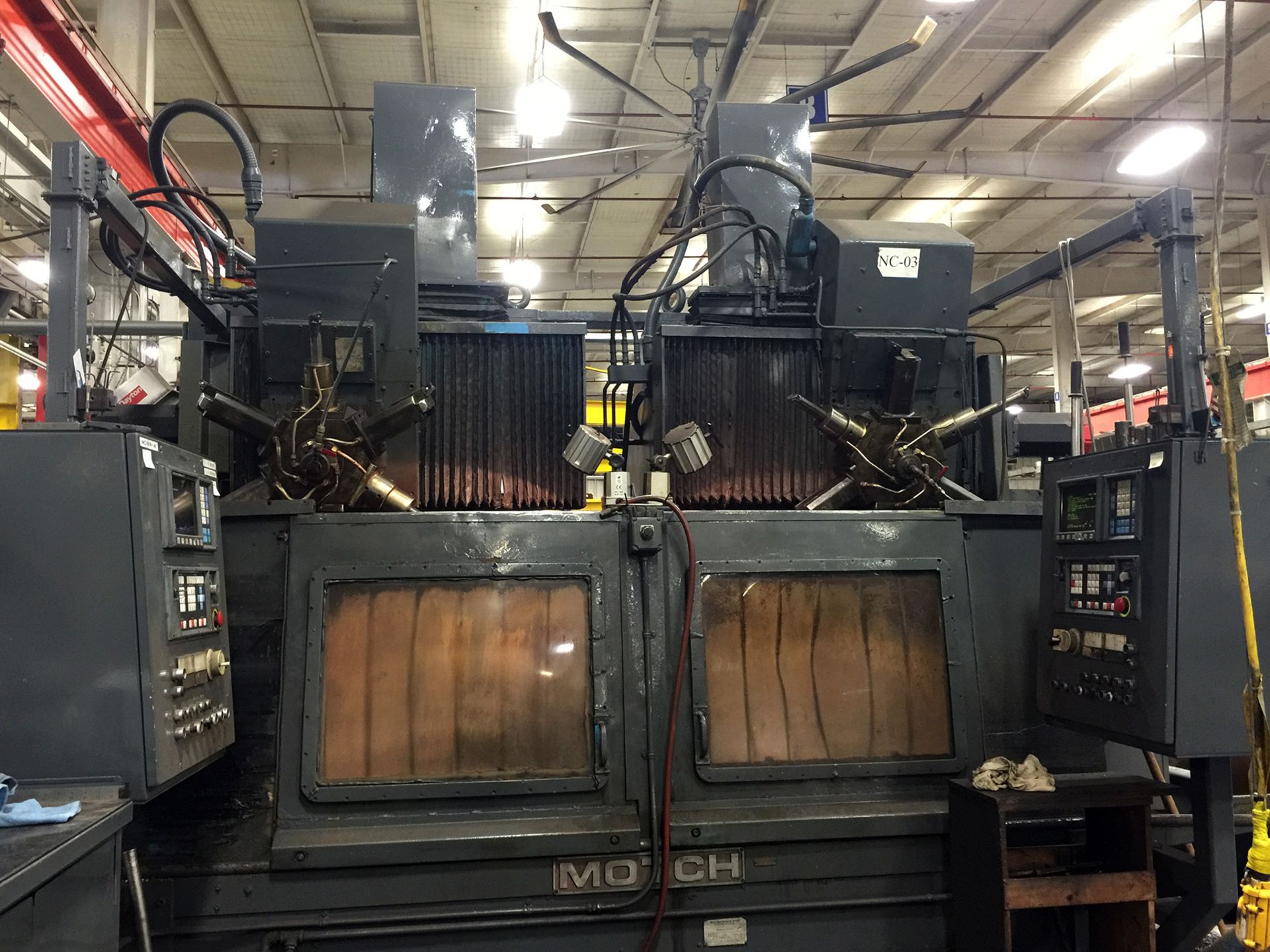 Motch Twin Spindle CNC Vertical Turret Lathe