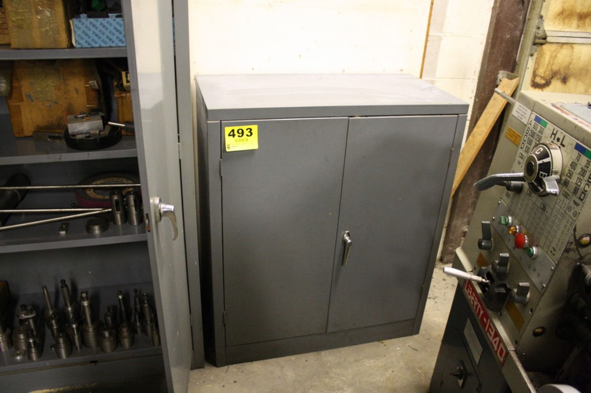 35â€ X 18â€ X 42â€ TWO DOOR STEEL STORAGE CABINET WITH CONTENTS