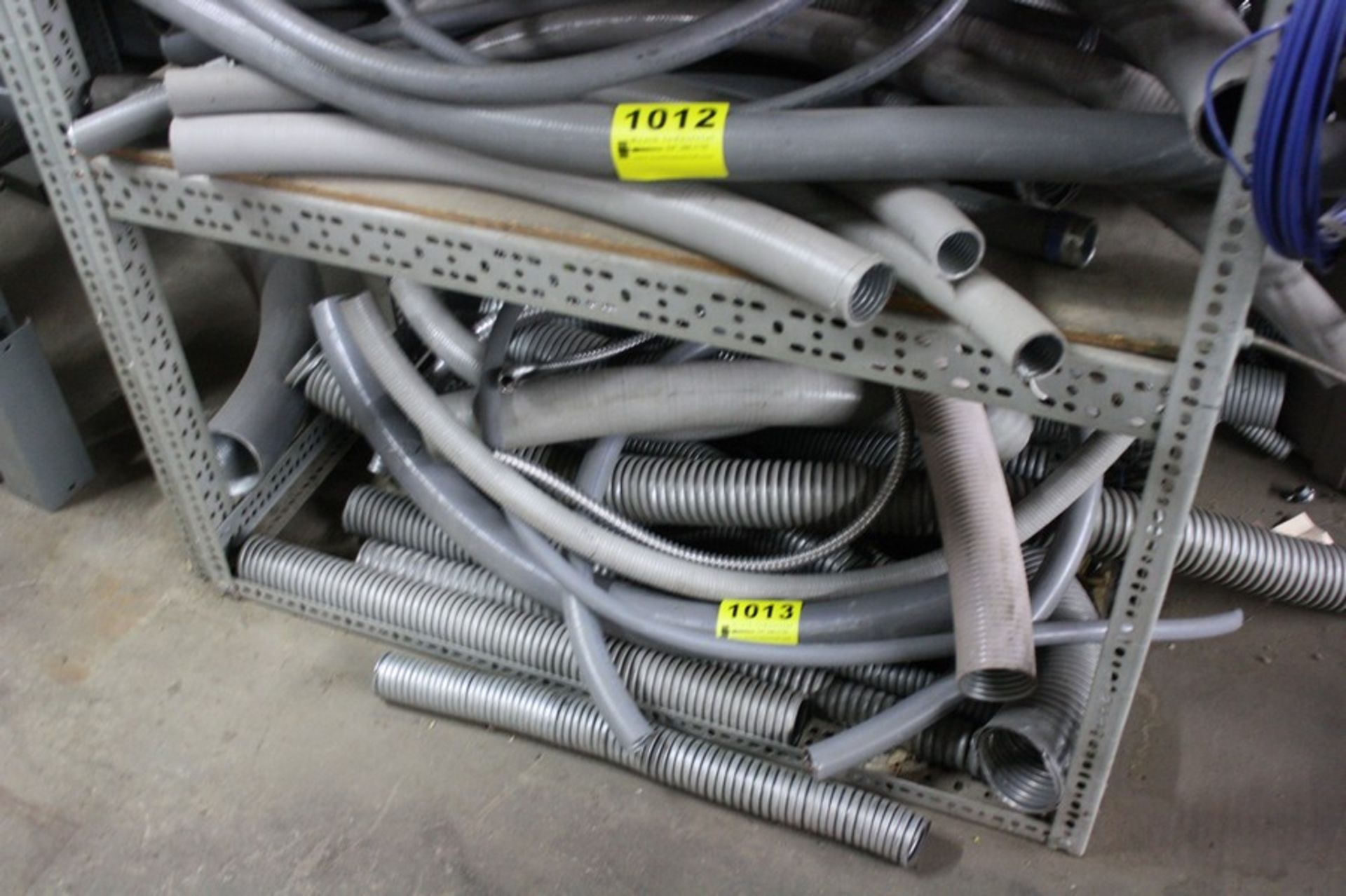 ASSORTED FLEXIBLE CONDUIT ON SHELF