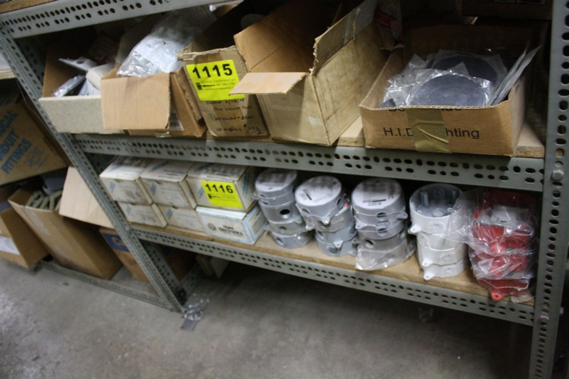 ASSORTED OUTLET BOXES AND PLATES ON SHELF
