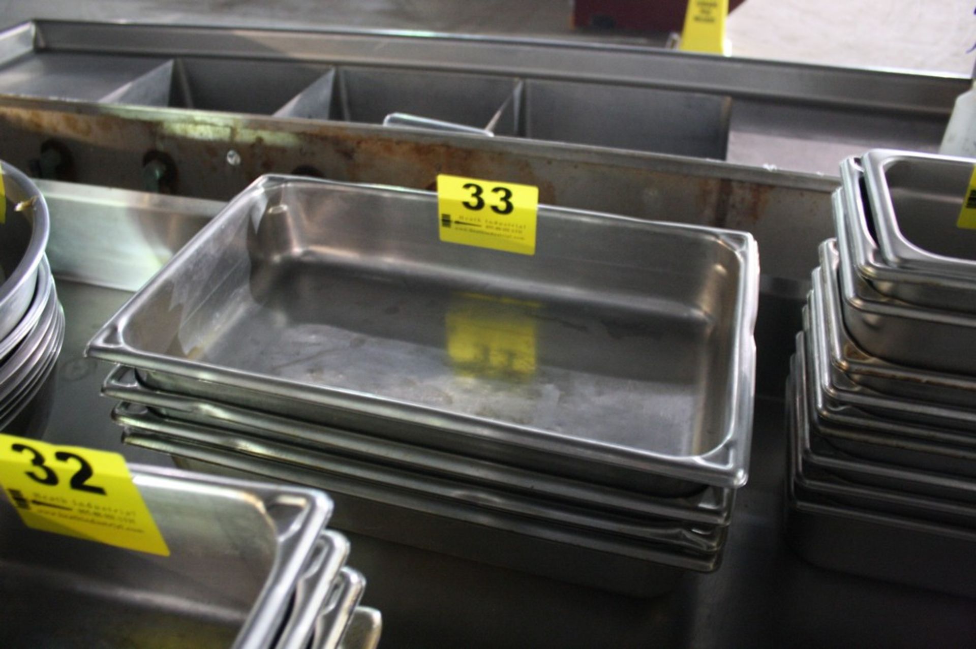 (4) STAINLESS STEEL SERVING TRAYS-21" X 12"
