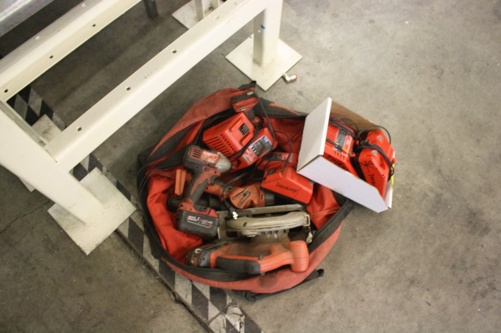 BAG OF MILWAUKEE CORDLESS TOOLS, INCLUDING CIRCULAR SAW, DRILL, FLASHLIGHT, BATTERIES AND CHARGERS