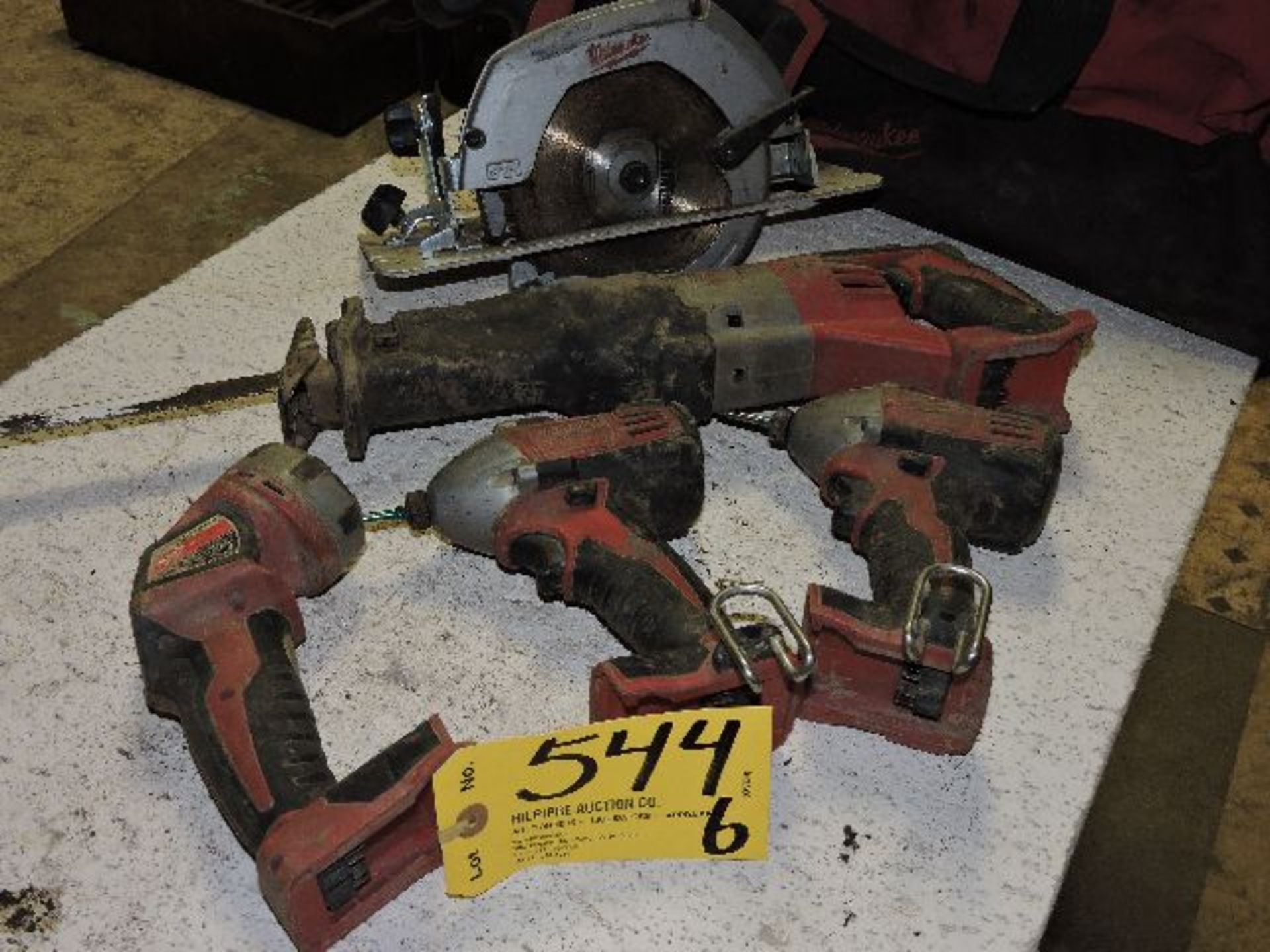 Milwaukee cordless (1) circular saw, (1) sawzall, (2) impacts, (1) bag.