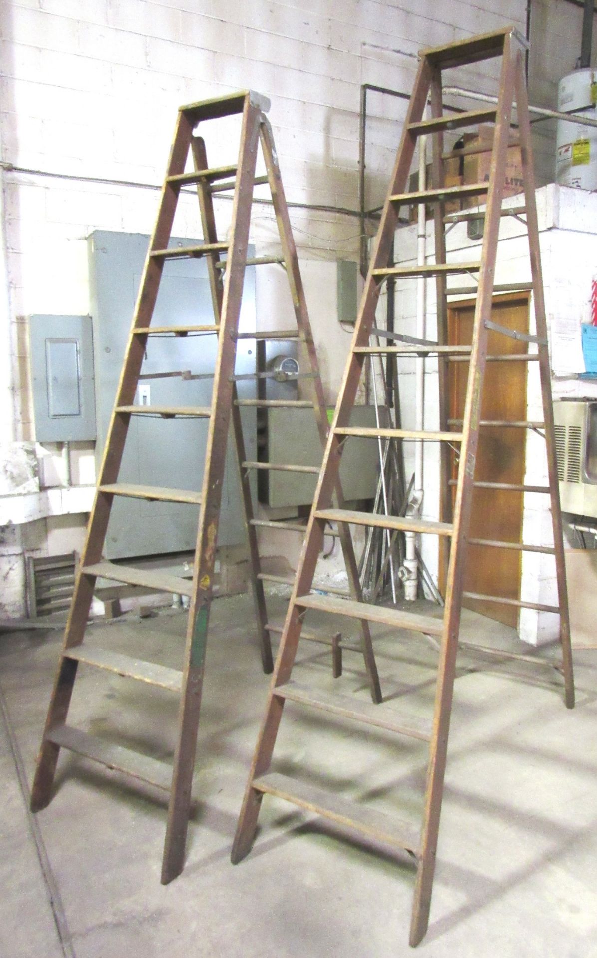 2- Werner 10' & 9' Wood Ladders