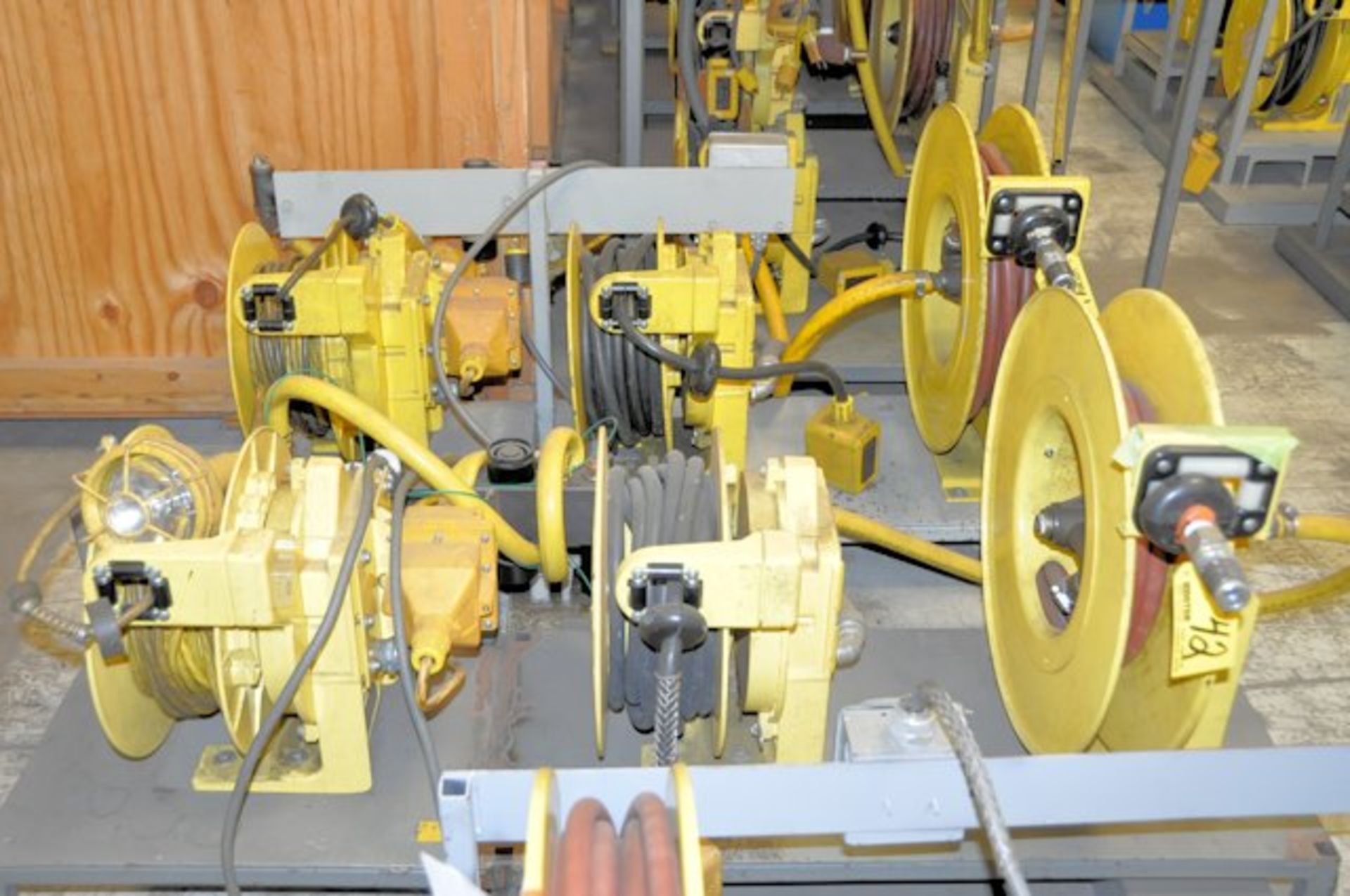 LOT OF AERO-MOTIVE INDUSTRIAL RETRACTABLE REELS CONSISTING OF: [2] AIR HOSE REELS, [2] EXTENSION