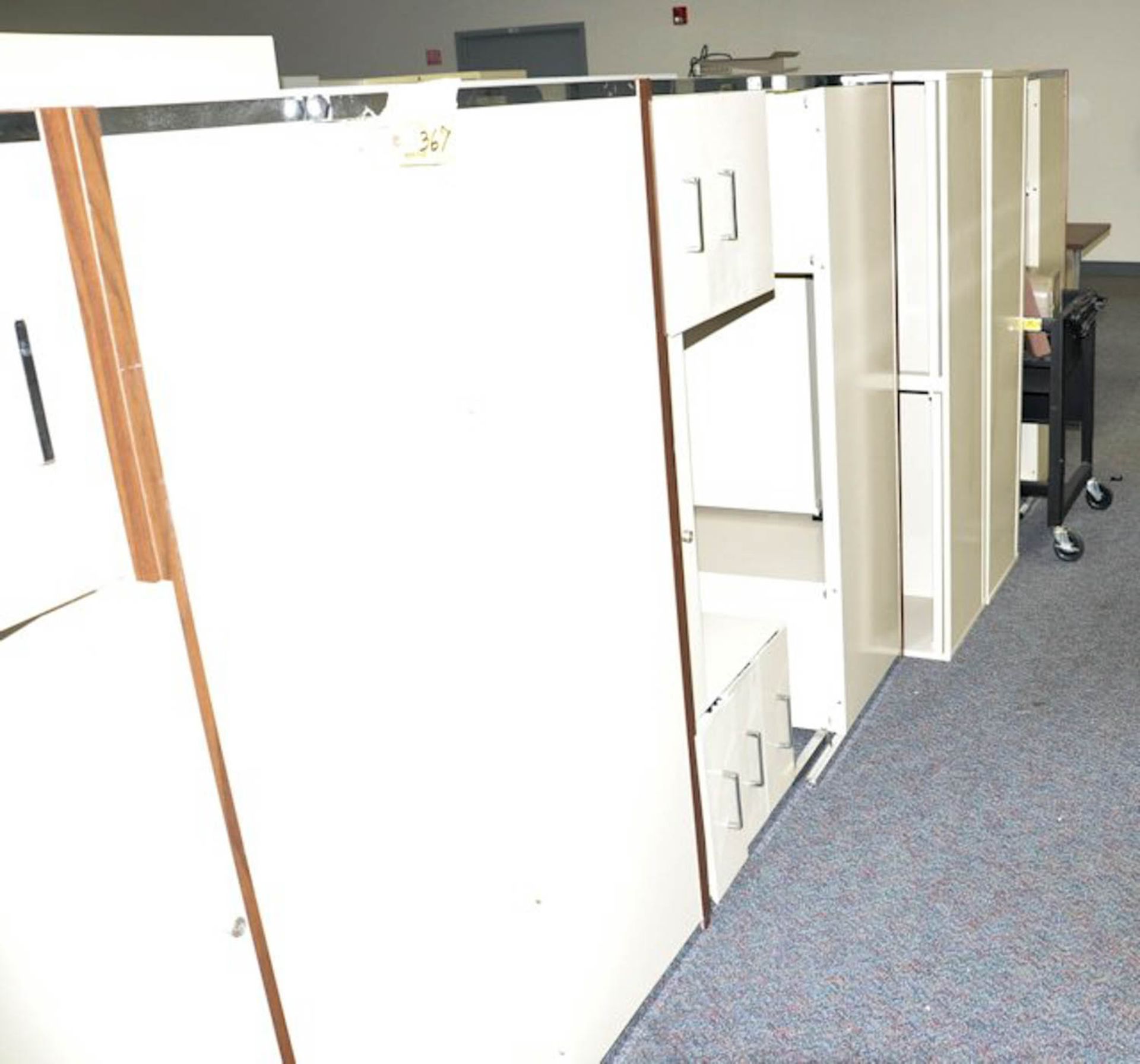 LOT OF DESKS AND LATERAL FILE CABINETS IN (4) ROWS