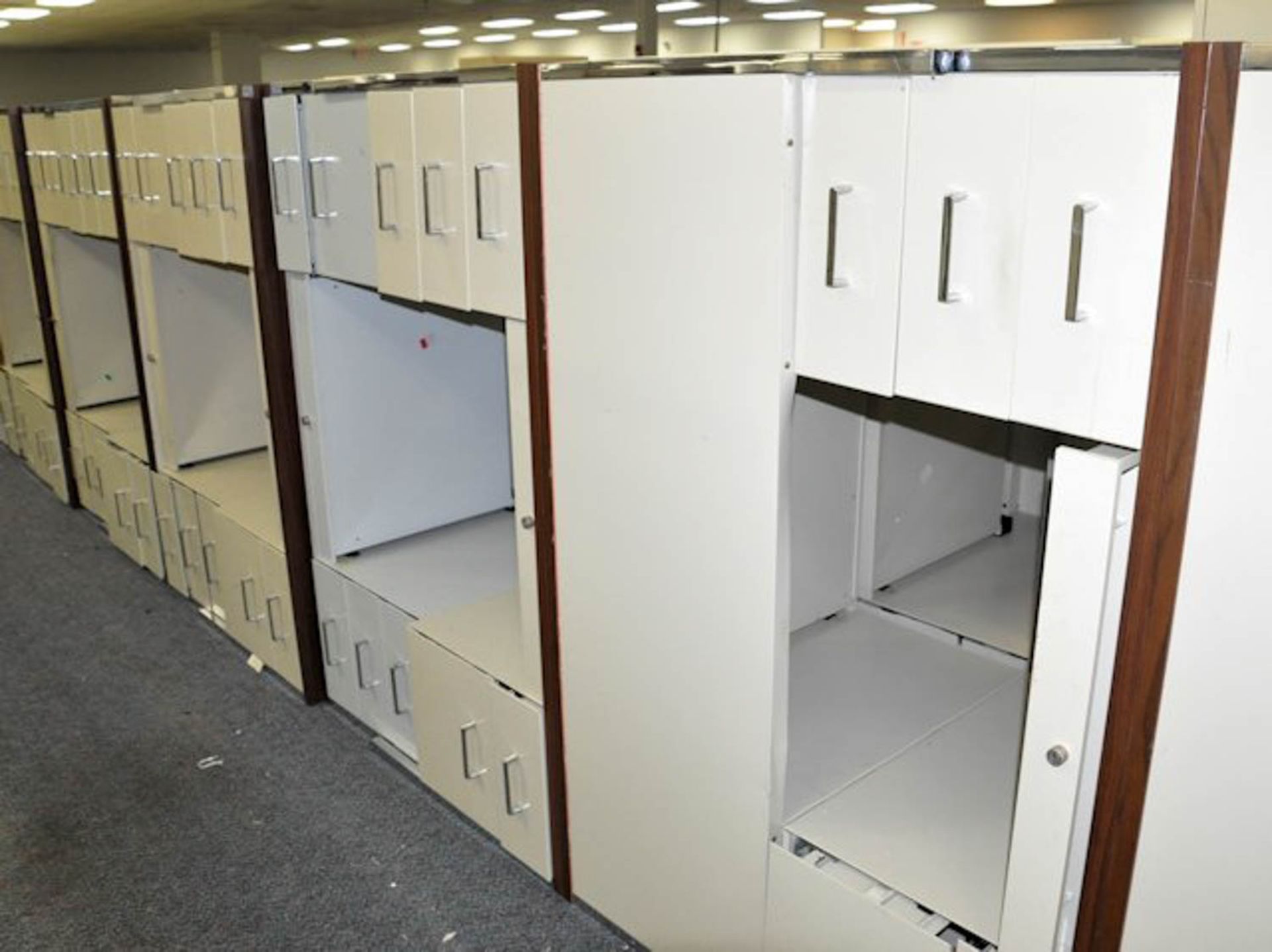 LOT OF DESKS AND LATERAL FILE CABINETS IN (5) ROWS