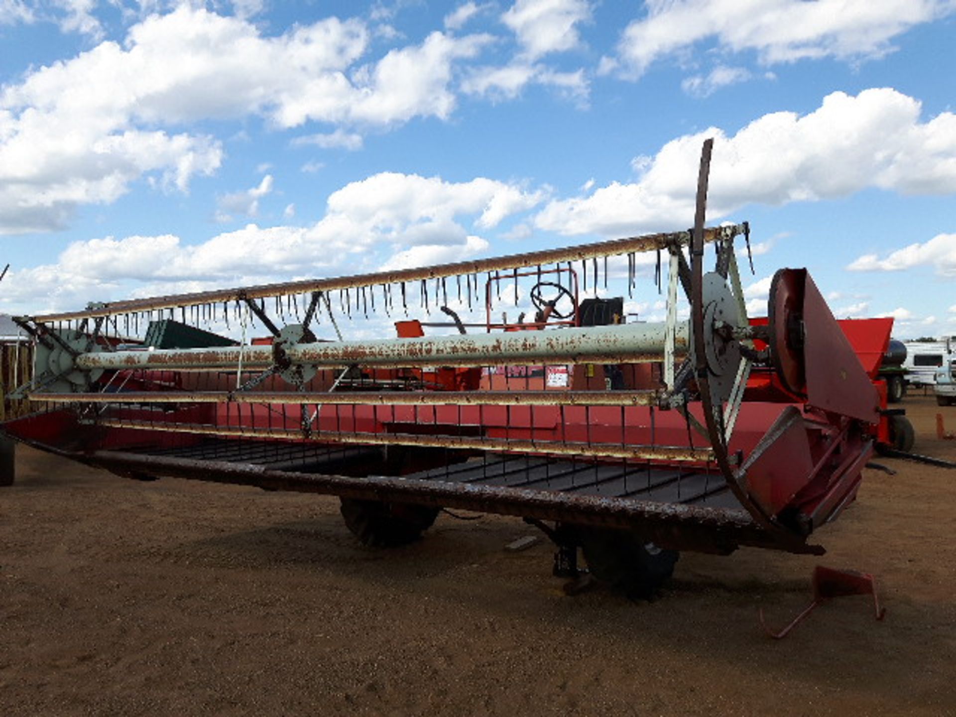 MF 775 Swather