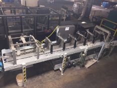 Climax Packing Machiners Laner Drop Case Packer with two pallets of shoots for different size