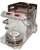Fette Checkweigher model 719 checks hardness, weight & thickness For reliable tablet quality