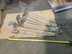 An Assortment of Stainless Steel hand mixers (3), Scraper (1), float ball (1), sample collector/