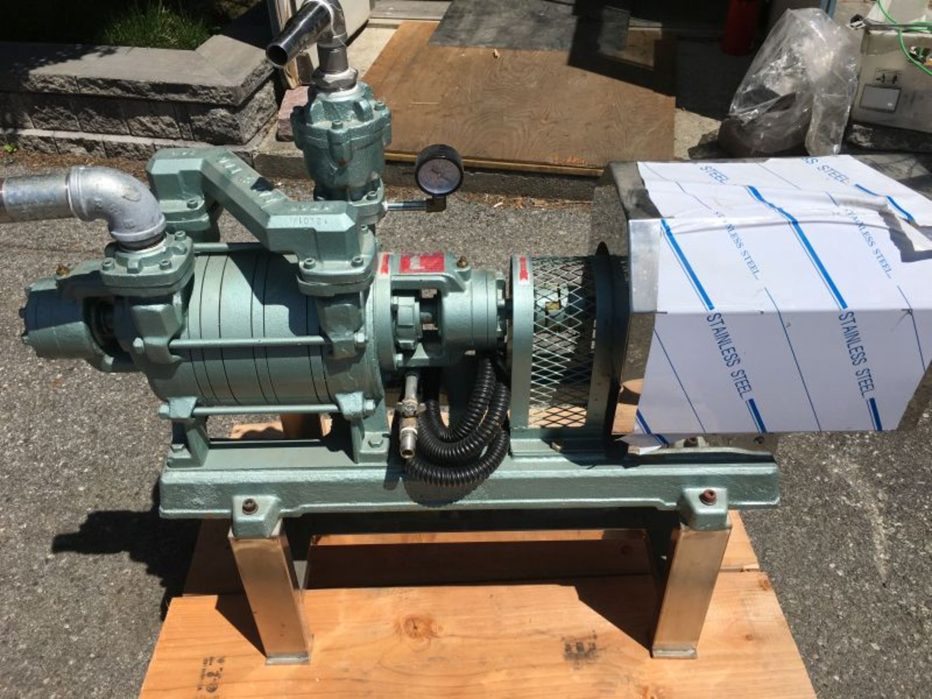 SWPL Vacuum Pump. Model 030V, Rated at 1500 Liters/Minute, driven by a 3 HP motor. (Located in New