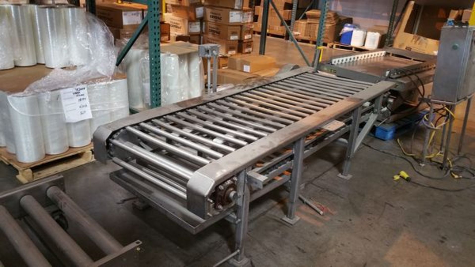 28' total motorized 640 Block Conveyor including 3 sections of conveyor and a lift station ( - Image 7 of 8