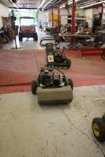 (2) (2) John Deere 180A walk behind lawn mowers complete with grass catchers. Used for Tee Box and