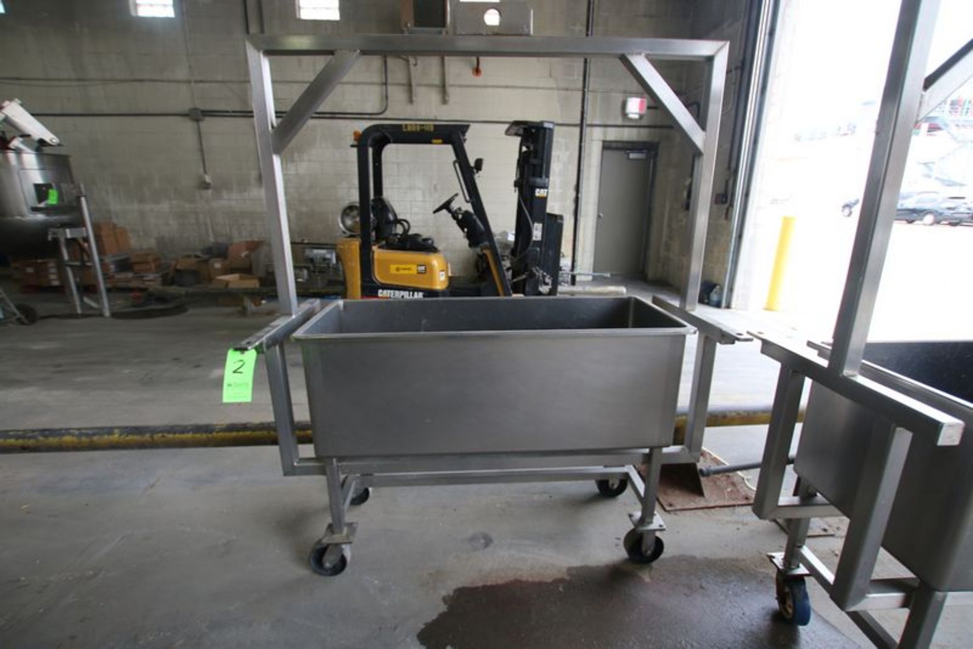 Portable S/S COP Tank. Mounted on Casters. Approx Tank Dims: 51" L x 21" W x 18" D.***Located in