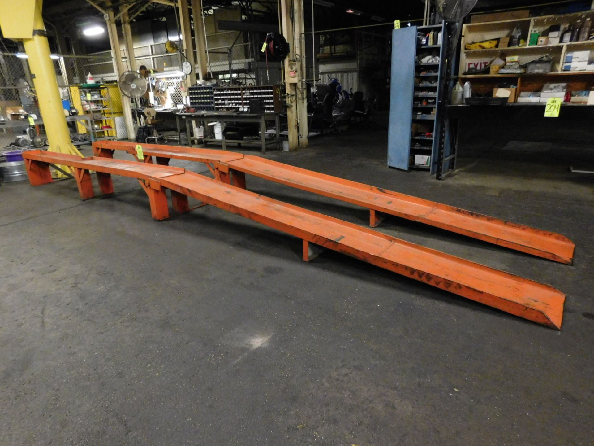 PAIR OF HEAVY DUTY TRUCK RAMPS, EA. RAMP IS 17" WIDE X 24' LONG AND DISASSEMBLES IN THE MIDDLE OF